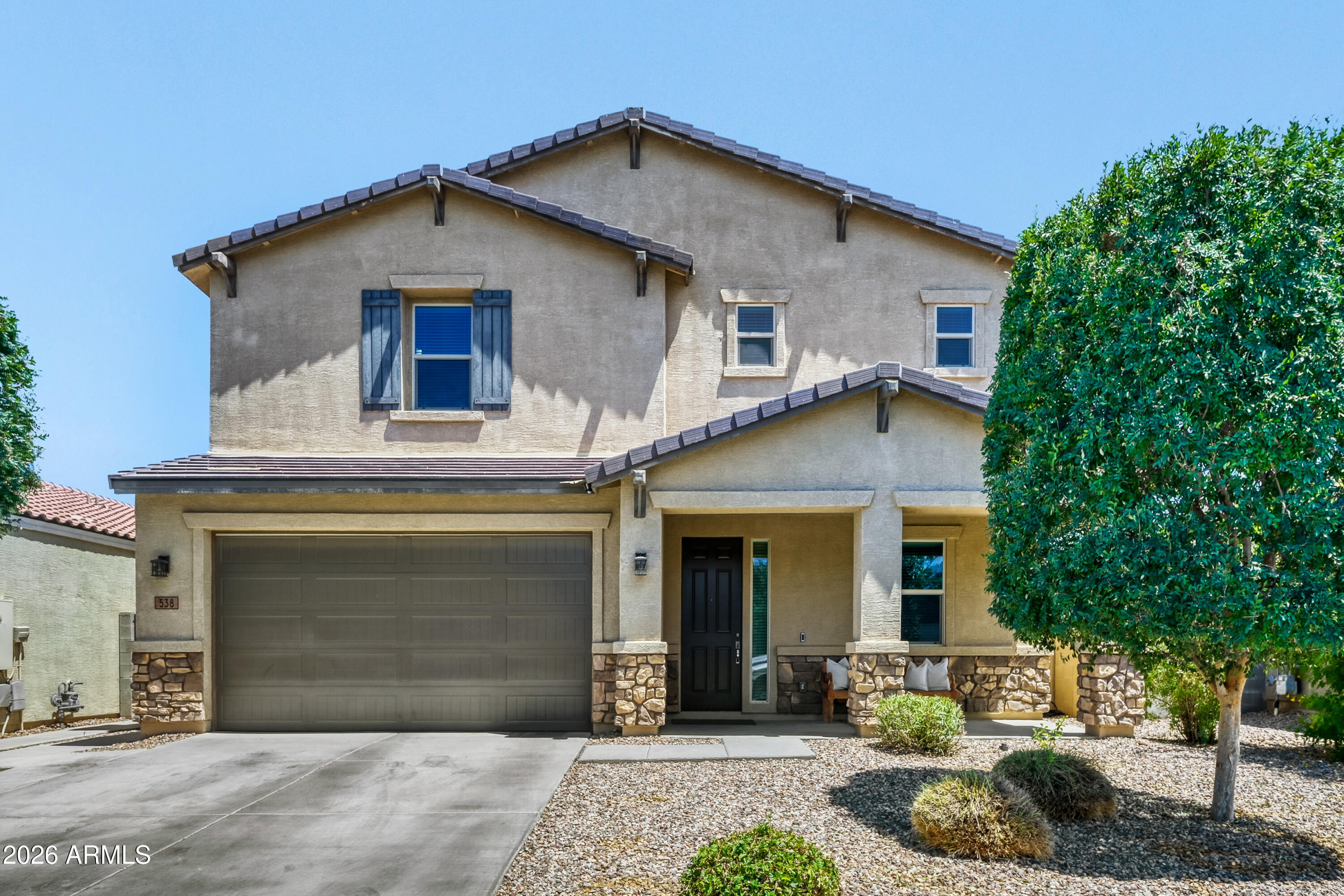 Welcome to this spacious, turn key home! Downstairs features a large great room just off the kitchen, huge pantry, den, guest bedroom and full bathroom. The upstairs greets you with a loft, master bedroom and 3 guest bedrooms with walk-in closets. Front yard and backyard yard are low maintenance with desert landscaping, artificial turf, an area for entertaining and citrus trees. The 3-car tandem garage is air-controlled and comes with overhead storage for extra space, storage and convenience. Great location, located just minutes from Queen Creek Marketplace, the Olive Mill, Schnepf Farms, regional parks, Banner Ironwood medical center and top-rated schools.