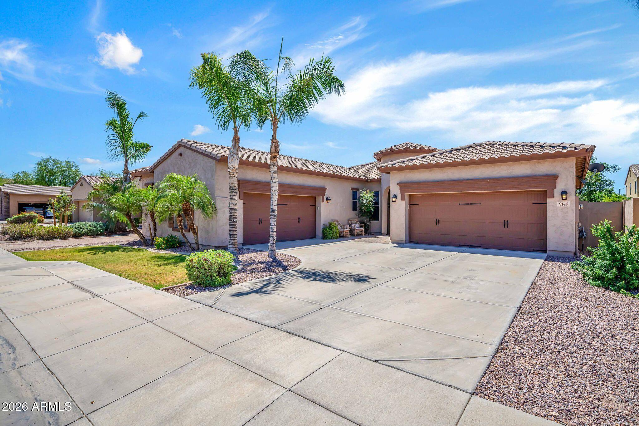 RARE 4 CAR GARAGE & RV GATE! Welcome to this beautifully maintained home in the highly desirable Cibola Vista community, where comfort, convenience & lifestyle come together. This rare property offers an impressive 4 car garage, RV gate, & a fully paved driveway perfect for car enthusiasts or anyone needing extra space for toys and storage. Inside, you'll love the open kitchen with an island that flows seamlessly into the living area, ideal for everyday living and entertaining. Enjoy modern comforts with a brand new 2025 AC unit, RO system, & water softener already in place. Step outside and take advantage of the fantastic location, close to parks and hiking trails. Situated in a wonderful subdivision known for its friendly neighbors and community feel, this home offers the perfect blend!