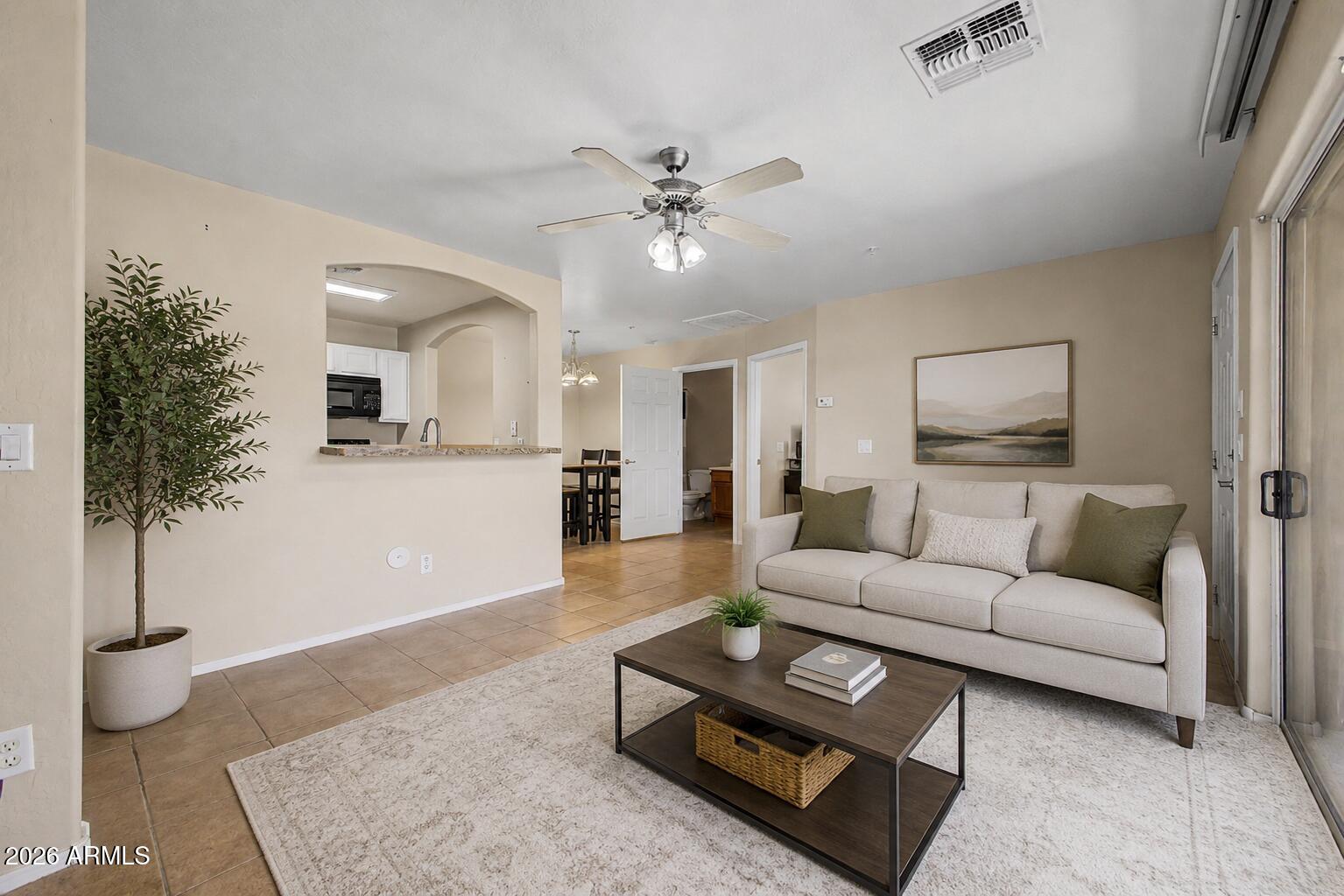 Seller offering $4k towards closing costs, rate buy down or pre paid HOA dues with full price offer. 2-bedroom, 2-bathroom apartment in Casitas Montana is the one for you! Discover the bright and inviting layout, featuring tile flooring, carpet in select areas, and two-tone paint that creates a welcoming atmosphere. The kitchen comes equipped with white cabinets, spacious counters, built-in essentials, and a pass-through with a breakfast bar. The main bedroom promises a good night's rest, including a full ensuite for added comfort, plus a practical walk-in closet for an easily organized wardrobe. Don't forget to visit the community's pool, spa, and walking path for a relaxing time! Enjoy the great location close to restaurants, shopping, and the highway! Hurry up, this gem won't last!
