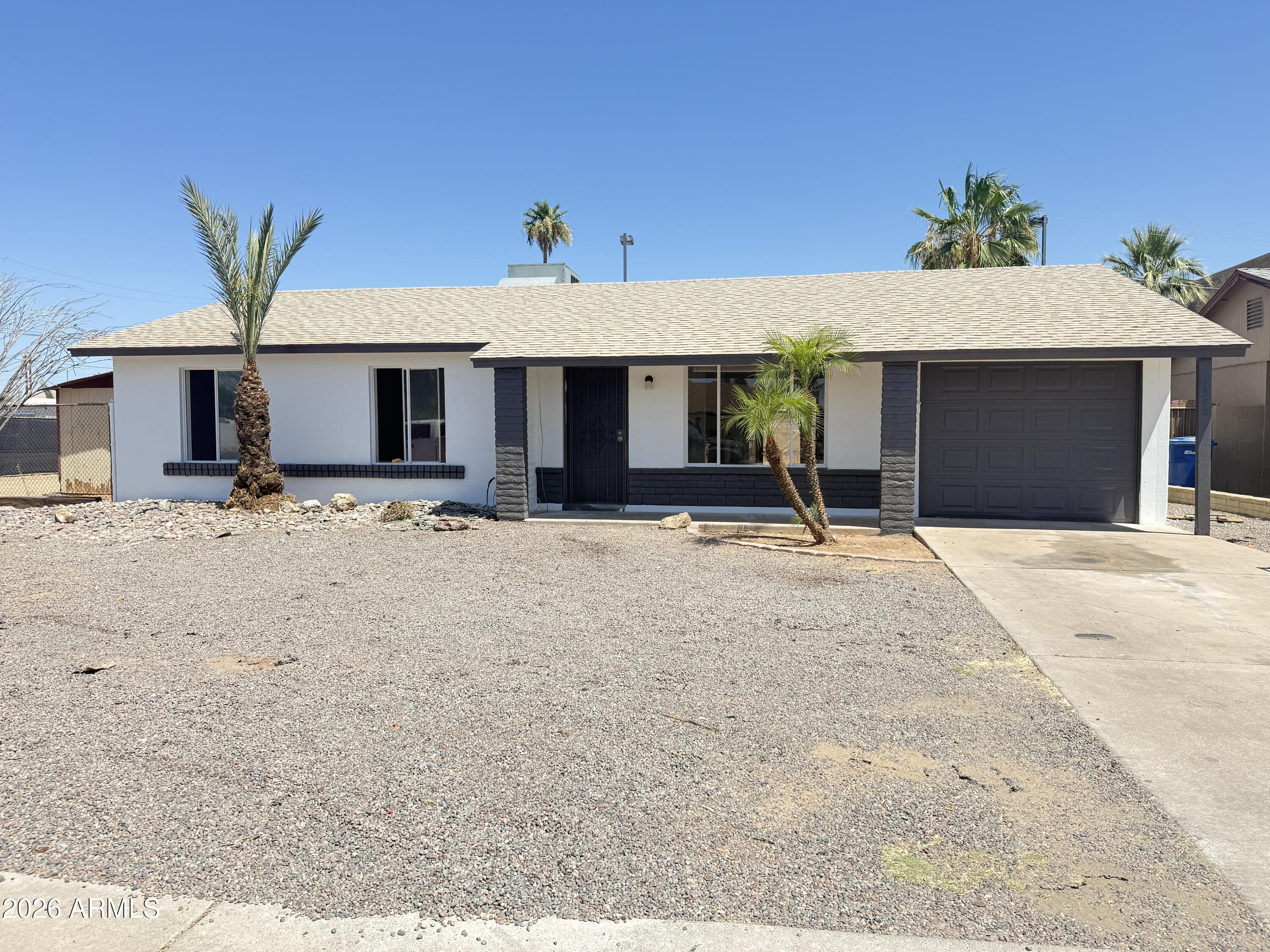 COMING SOON! Beautifully updated corner lot home in a prime Mesa location! This move-in ready 3-bedroom, 2-bath property features a newer roof (approximately 2 years old), updated flooring, remodeled kitchen, renovated bathrooms, updated interior doors, modern lighting, and fresh interior and exterior paint. The 1-car garage includes a mini-split system, offering flexibility for a workshop, gym, office, or bonus space. Situated on a large corner lot with RV gate access and ample parking. Conveniently located near shopping, dining, schools, parks, and freeway access. A well-maintained home with quality updates and plenty of versatility for today's lifestyle. MORE PICS AND DETAILS COMING SOON!