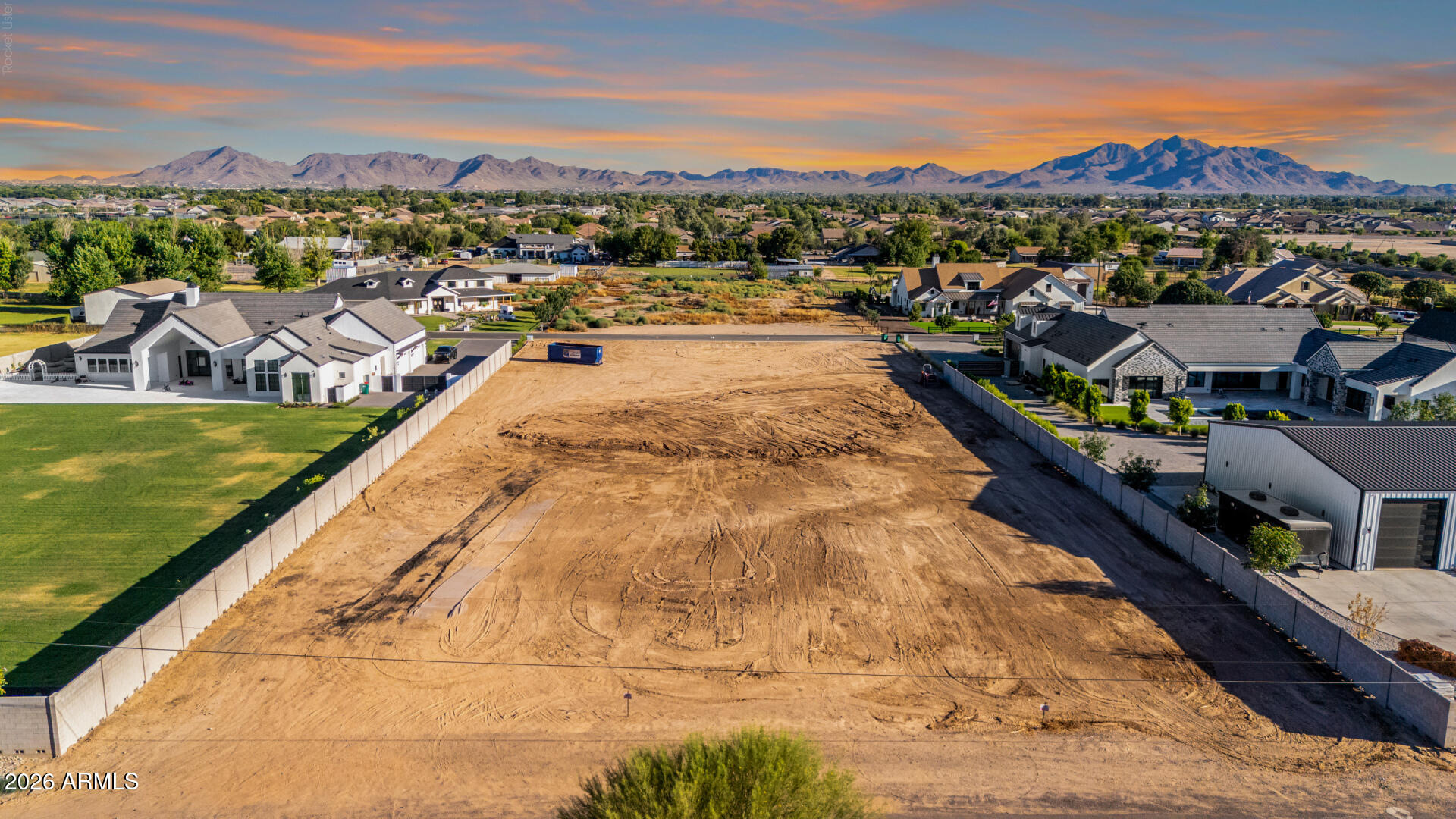 Discover a rare opportunity to build your dream estate on this expansive 1.75-ACRE homesite featuring the rare advantage of DUAL STREET ACCESS. Surrounded by exceptional custom residences and luxury estates, this property offers the flexibility to design a truly one-of-a-kind lifestyle tailored to your vision.
Whether you envision expansive RV garages, detached workshops, private casitas, sport courts, or other custom outbuildings, the R-43 zoning and COUNTY ISLAND location provide the freedom to build with NO HOA restrictions.
The groundwork has been laid, with ELECTRIC & WATER available at the property, along with flood irrigation. Existing block fencing provides privacy and clearly defined boundaries, helping streamline the path toward construction of your custom home. Ideally situated near Mansel Carter Oasis Park, residents enjoy access to lakes, walking paths, playgrounds, sports fields, and a variety of recreational amenities. Despite its peaceful estate setting, the property is conveniently located near QUEEN CREEK MARKETPLACE, Gilbert Regional Park, shopping, dining, freeway access, and Phoenix-Mesa Gateway Airport. 
Properties of this caliber rarely become available. Offering 1.75 ACRES, DUAL STREET ACCESS, NO HOA, ESTABLISHED UTITLITES, and an exceptional setting surrounded by luxury custom estates, this is a truly special opportunity to create the estate you've always envisioned.
