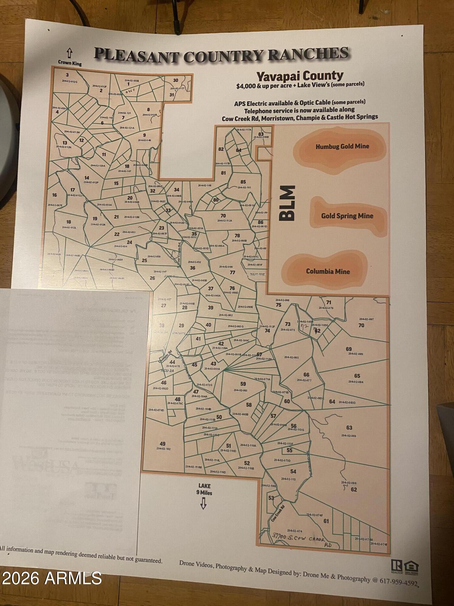 Best to make appt locked gate or you can walk around fence line to driveway and walk down to where the equipment ,truck is and that is parcel E  2 acres flat pad $62,500  ,B is $38500 also parcels D,C and A.  secluded views of Bradshaw Mountains and Black Hills.  Owner is a road contractor he will help you  with road and pad.
below is cottonwood creek and Heisman spring
OWNER WILL CARRY  WITH LOW PAYMENTS.
 approx 11 miles from end of lake (culvert bridge
Pleasant Harbor marina and sorpian Bay have restuarants,stores,camping boats fishing,etc)