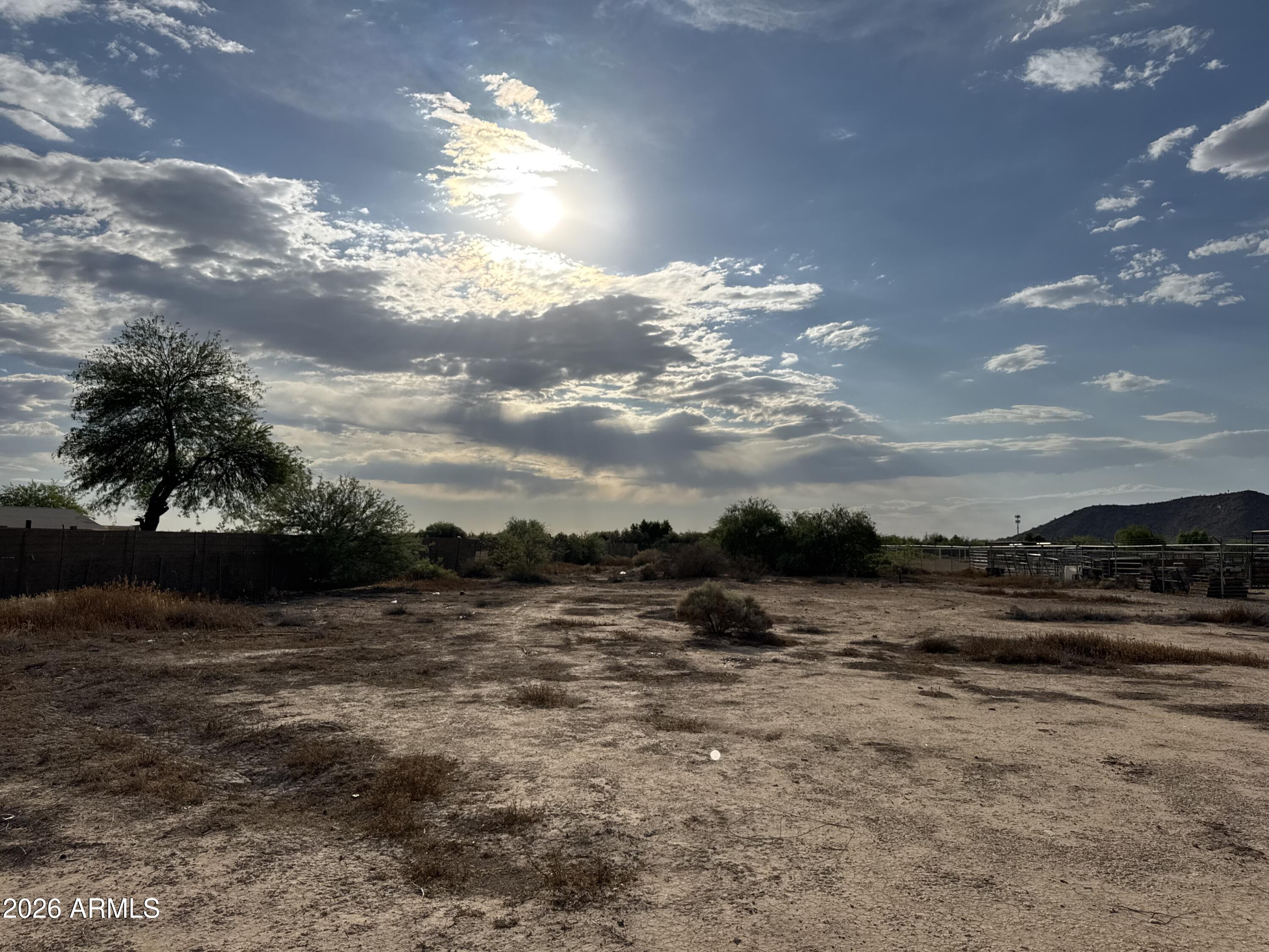 Great opportunity to own over 1 acre of land with beautiful mountain views. This horse property offers plenty of open space and is conveniently located near I-10 for an easy commute. Bring your animals, toys, and future vision for the property while enjoying Arizona sunsets and nearby city conveniences.