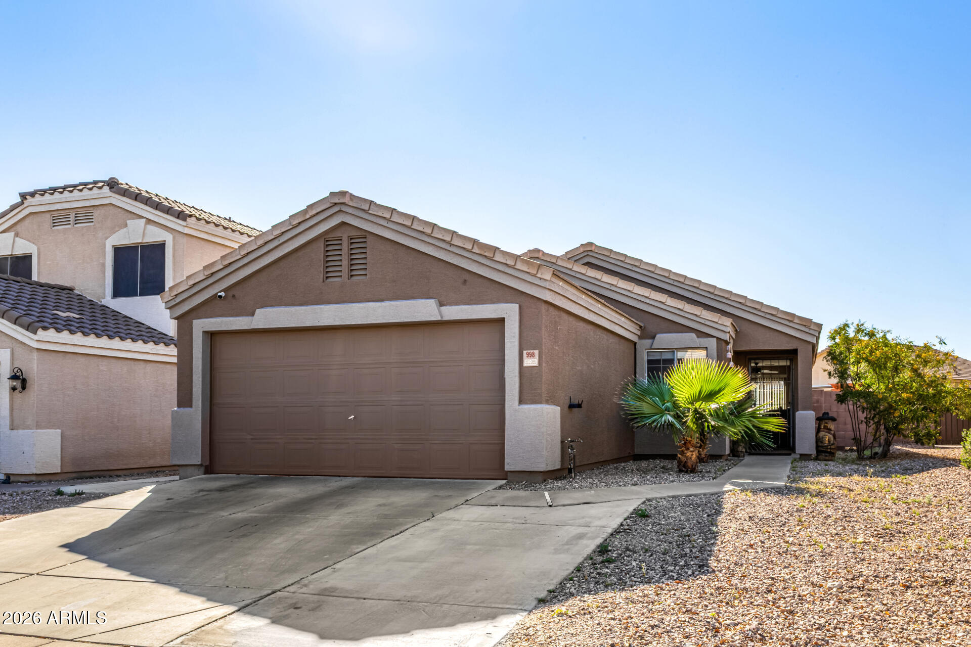 Bright, well-maintained Buckeye home offering comfort, style, and easy everyday living. Inviting curb appeal with clean desert landscaping welcomes you in. Inside, spacious living areas feature plush carpeting and a functional layout ideal for relaxing or entertaining. The open kitchen showcases rich cabinetry, granite countertops, stainless steel appliances, and a window over the sink that fills the space with natural light. A cozy dining nook overlooks the backyard with convenient access to the patio. Step outside to a private backyard retreat with room to entertain, grill, or garden. Conveniently located with quick access to I-10, making commuting and daily travel simple. Move-in ready and designed for comfortable Arizona living.