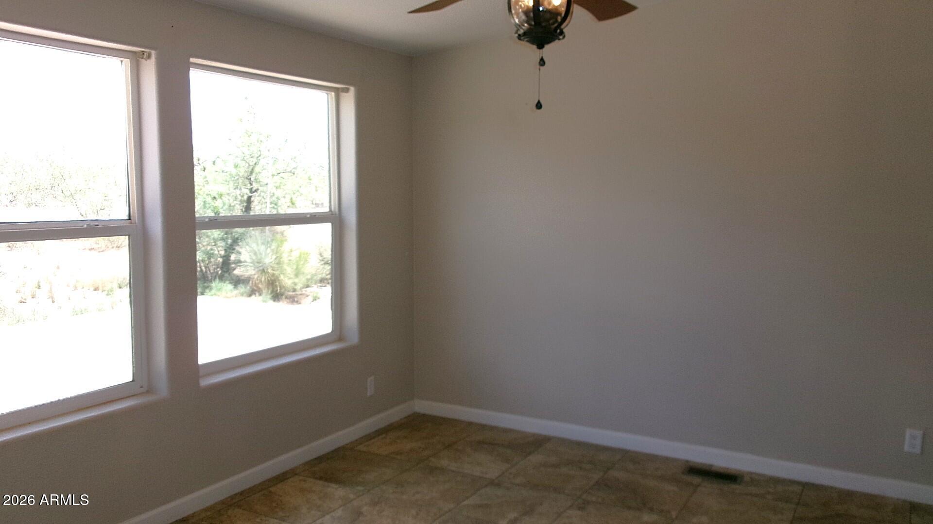 This is a huge home for the money! Do not miss it! This home features a large living room, dining room, family room with a real fireplace and a split floor plan. The kitchen is at the center of everything making entertaining a breeze. The master suite features a retreat area as well as a very large walk in closet, dual vanities and a separate tub and shower. The secondary bedrooms are all good sized too. You will never tire of the beautiful mountain views! Best of all, Va Vendee financing MAY be available on this property.