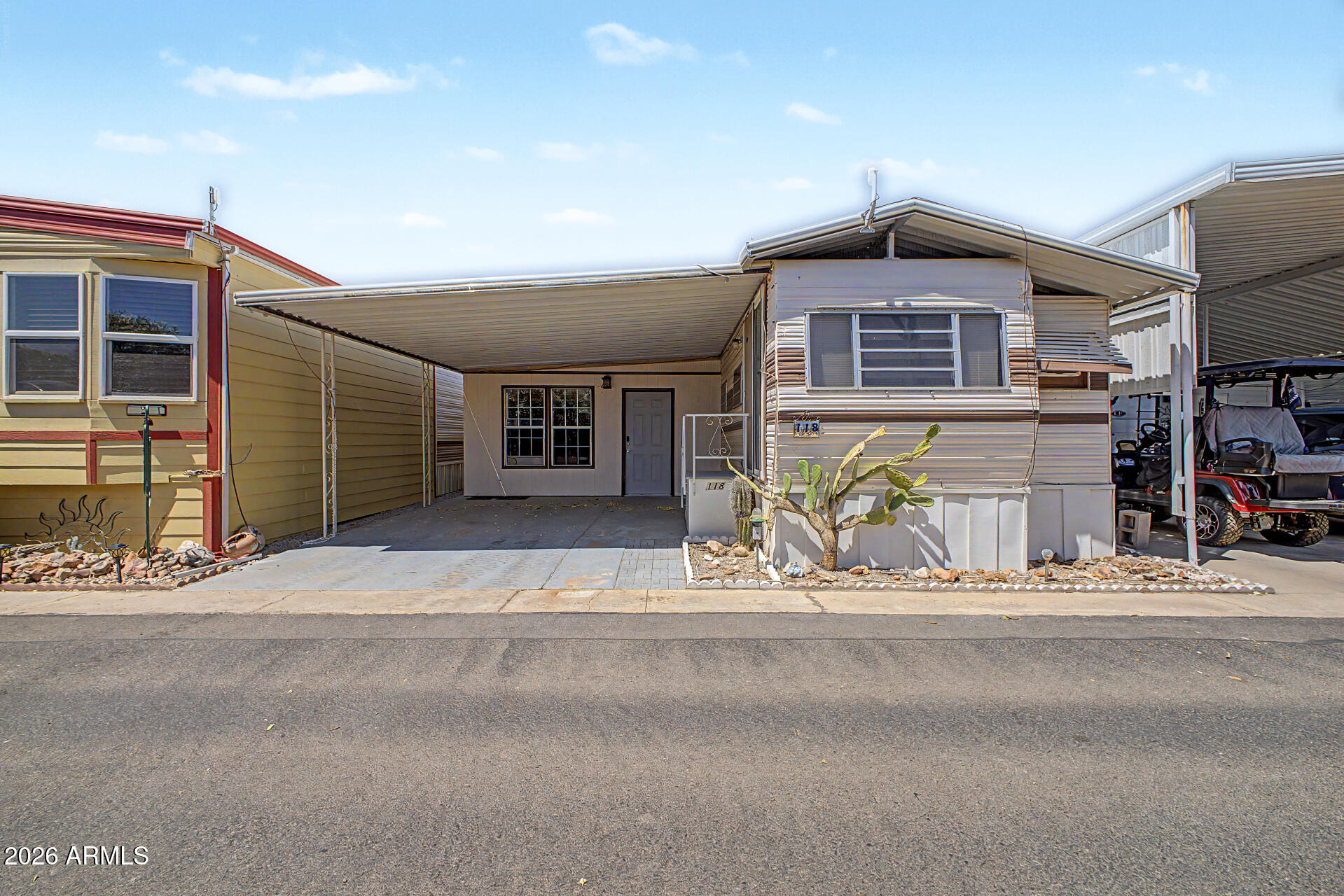 Seize the chance to own this mobile home in the adult Community of Caliente Casa Del Sol! Inside, you'll find an inviting living room with a soothing palette, blinds, and concrete flooring. The eat-in kitchen comes with wood cabinetry, built-in appliances, and a pantry for storing culinary essentials. The bedroom is cozy and well-sized, offering a private retreat for a good night's sleep. Don't miss out on this one!