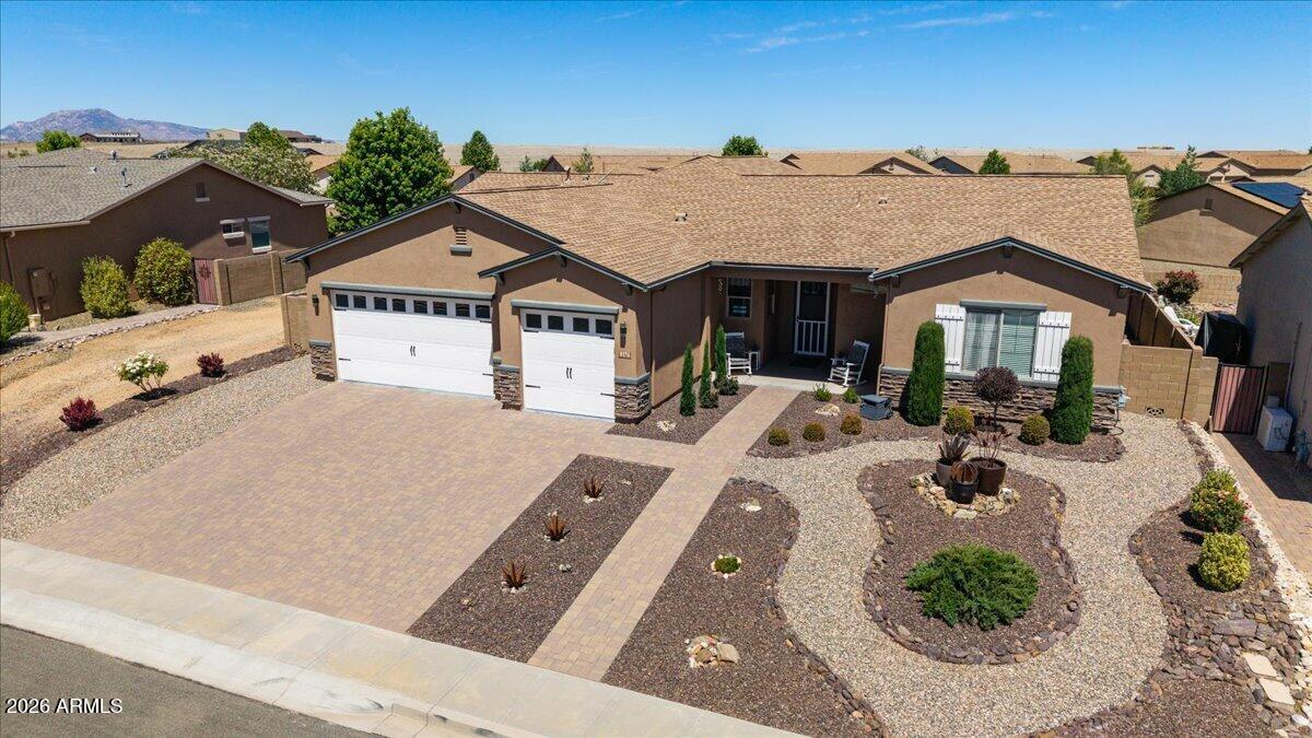 Welcome to this beautifully maintained 4-bedroom, 2-bath home with a spacious 3-car garage, located in the desirable Viewpoint community! Designed for both comfort and efficiency, this home features paid solar installed in 2023, helping keep energy costs low, along with a new roof (2021), fresh exterior paint (2022), and updated appliances (2022) for added peace of mind.

Inside, you'll find a functional and inviting floor plan with plenty of space for family, guests, or a home office. The spacious primary suite offers a private retreat featuring a large walk-in closet, double vanity, and walk-in shower. Thoughtful updates and comfortable living spaces throughout make this home truly move-in ready. Step outside to your own backyard oasis featuring low-maintenance turf, a storage shed, and a relaxing hot tub--perfect for entertaining, family gatherings, or unwinding after a long day. A water softener adds even more convenience and value.

Situated on a beautifully landscaped lot with a low HOA, this property offers the perfect combination of modern updates, energy efficiency, and outdoor enjoyment. Enjoy all that the sought-after Viewpoint community has to offer while being conveniently located near shopping, dining, parks, and everyday amenities.

This exceptional home combines comfort, efficiency, and style--making it the perfect place to call home!