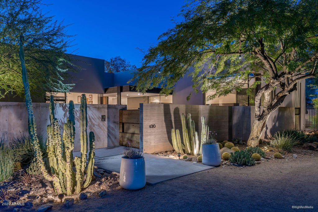 Arriving through the private courtyard, a sense of calm comes over you. Thoughtfully crafted architecture by Tennen Studio and rich natural materials draw you into an exquisite home where the indoor and outdoor living spaces blend seamlessly. Warm woods including mesquite and walnut are complimented by cast in place concrete, limestone and marble. Sophisticated millwork and cabinetry, custom hardware, Gaggenau appliances and Savant home automation. Expansive Mountain views in multiple directions are purposefully framed through fantastic glazing while the home maintains complete privacy.  Floor to ceiling doors and windows showcase the curated landscapes with native trees and vegetation. An art collectors dream home, this home is living art and also lives impeccably.... with casual and formal living spaces, 5 bedrooms, 5 1/2 baths, two laundry rooms, a fantastic walk-in wine room and multiple entertaining areas. The home also features significant solar panels generating much of the power needed to run the home. Set at the end of a quiet cul-de-sac, the home is truly a private retreat.