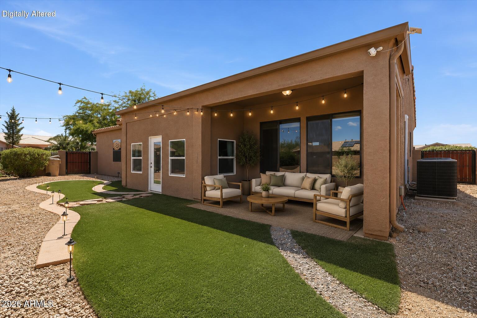 NO HOA! Bring your RV, boat, and toys to this rare double-lot property in Arizona City. The expansive backyard features a 24' rolling gate, full RV hookups, extensive concrete patios, a covered patio, fire pit area, custom chicken coop, low-maintenance landscaping on automatic timers, an insulated shed with power, and an additional storage shed. Inside, this 2,109 sq ft custom home offers a spacious split floor plan, formal living and dining areas, generously sized bedrooms, and an oversized garage. The kitchen features a large quartz island with unique copper inlay, walk-in pantry, and breakfast nook. The primary suite includes a custom walk-in shower, dual vanities, and a large walk-in closet. Secondary bedrooms share a Jack-and-Jill bath, plus a half bath for guests.