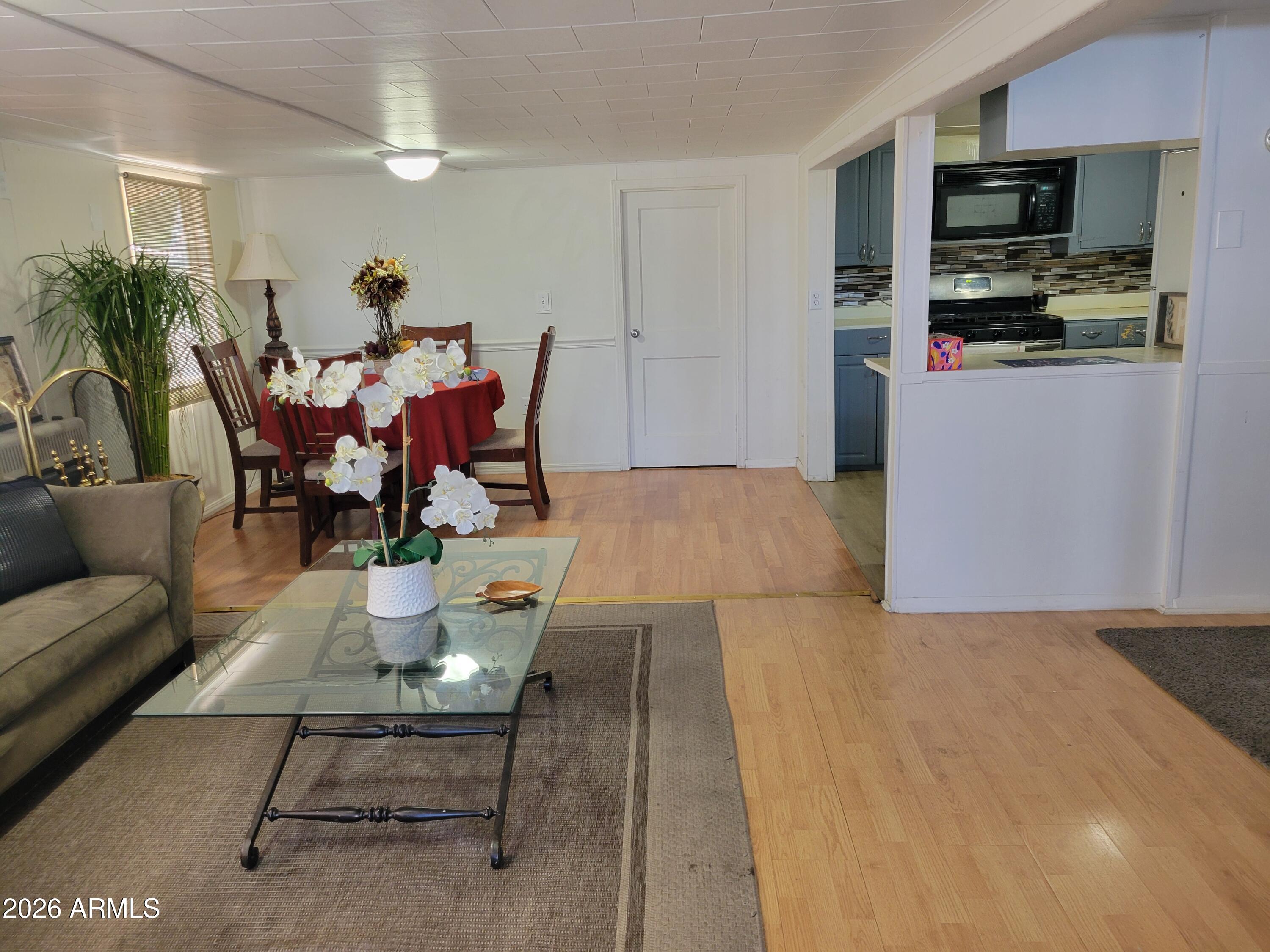 Check out this adorable gem in the gated 55+ community of Trail Riders Ranch! With plenty of room for entertaining, and a large backyard with citrus trees, you'll feel at home! Enjoy coffee on your front porch, or turn the third bedroom into a craft room! The possibilities are endless. Welcome home!