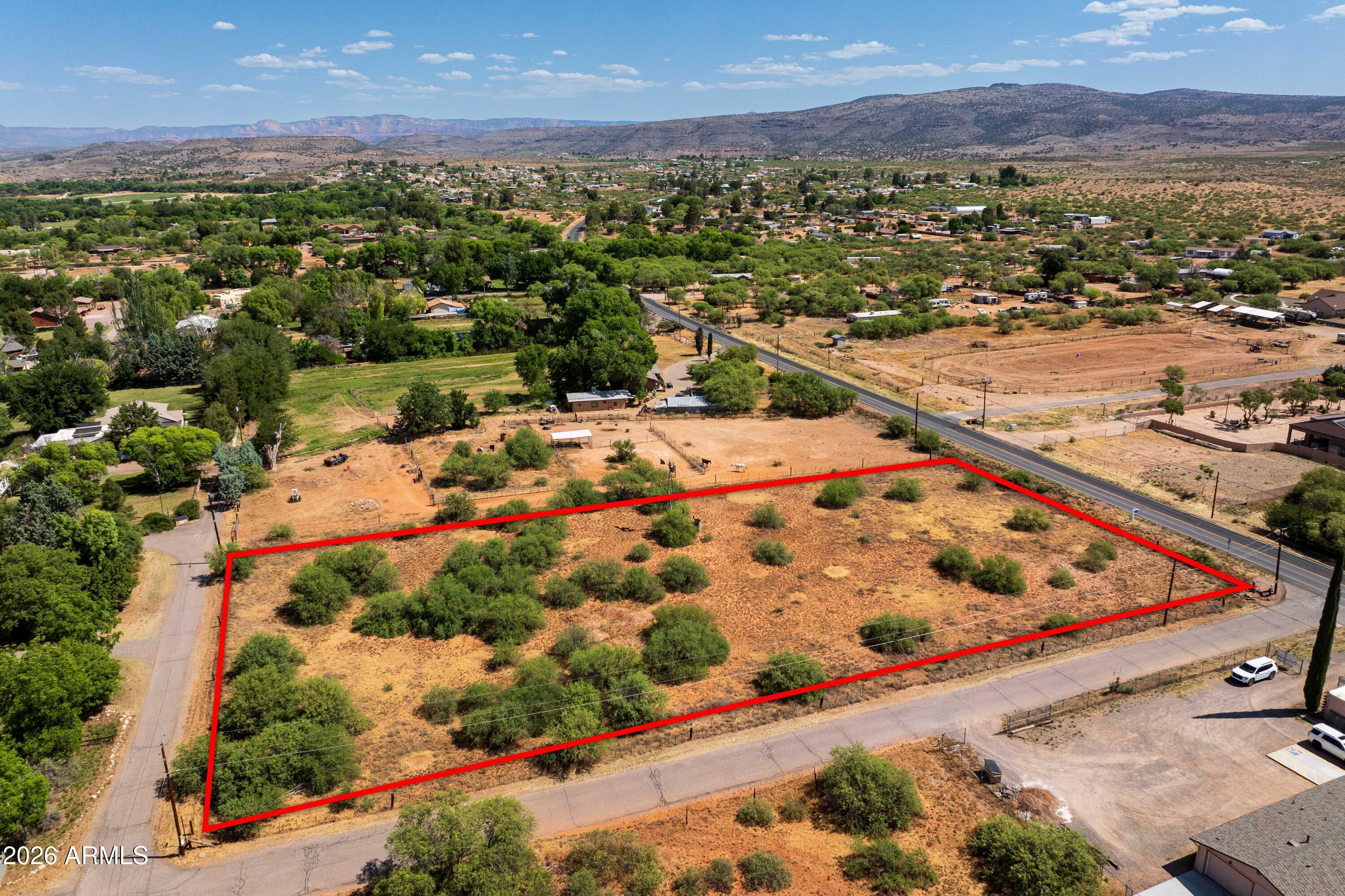 Fenced 2 acre parcel on popular Page Springs Road, zoned for multi-family and single family homes. Great access and location.  Na opportunity to live in AZ Wine Country corridor. Don't miss this opportunity.