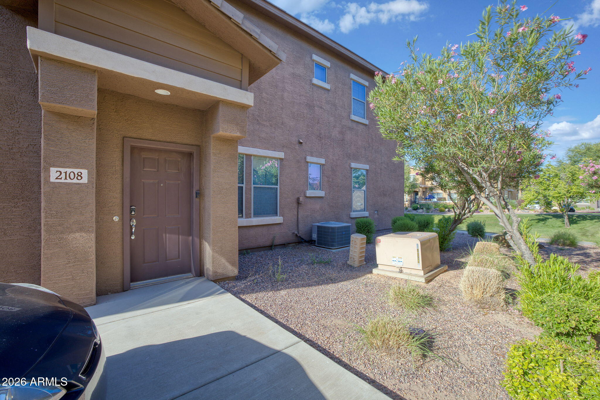 Welcome to your perfect Arizona retreat! This beautifully maintained fully furnished 2-bedroom, 2-bath townhome in the heart of Surprise offers comfort, convenience, and an unbeatable location directly across from the Spring Training facility. Nestled inside a desirable gated community, residents enjoy access to a sparkling community pool, playground area, and beautifully kept grounds. Step inside to find a move-in-ready home complete with all furniture, appliances, and everything you need to settle in with ease. The open and inviting layout is perfect for relaxing or entertaining, while the attached 1-car garage and additional assigned parking space provide added convenience. Enjoy being just minutes from top-rated shopping, dining, golf, and entertainment options.