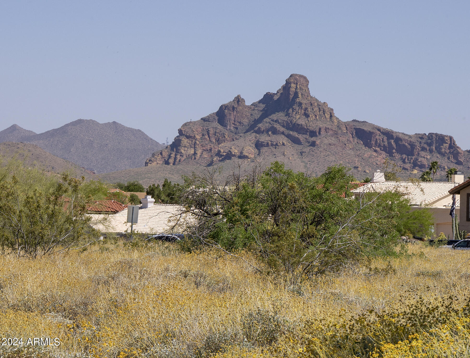 Beautiful 2.6 acre parcel zoned R1-8 with excellent views of Red mountain. Preliminary talks with the city indicate the possibility of splitting the lot into 3 to 5 parcels with a long private drive up to the building sites enjoying Red Mountain views and privacy. Great location with easy access to Shea Blvd and only a couple of miles to downtown Fountain Hills. See documents tab for Aerial, sewer, and contours.  ''This property is under the jurisdiction of the NPOA (Neighborhood Property Owners Association). This organization is NOT an HOA and has no monthly fees, but does impose a set of CCR's and other guidelines.'' Survey has been ordered.