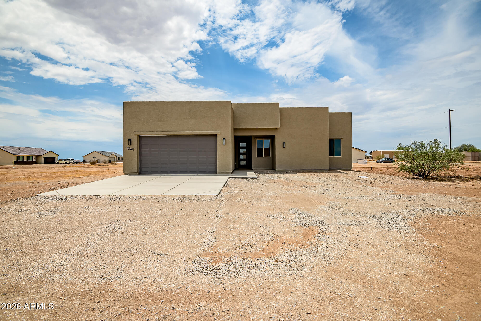 Brand New home built to perfection! Located in quaint culdesac of acre properties w mountain views. Builder will include fencing at an increased sales price.  Kitchen is fantastic w/ island breakfast bar covered in level 3 granite or quartz (see pics) 2x6 exterior wall construction Anlin Windows, ''SIGA housewrap & tape system'' & loaded w many more upgrades. Bedrooms are spacious w all of them having walk in closets & Master w huge walk in shower. Excellent floor plan w awesome mountain views to the north & south. Property is located around upscale site built custom homes w underground power, close to US 60 freeway access a 5 part shared well & No HOA! Others to choose from. HURRY! Bring you horses and your toys! Located in excellent area of Wittmann.   Finished spec home.
