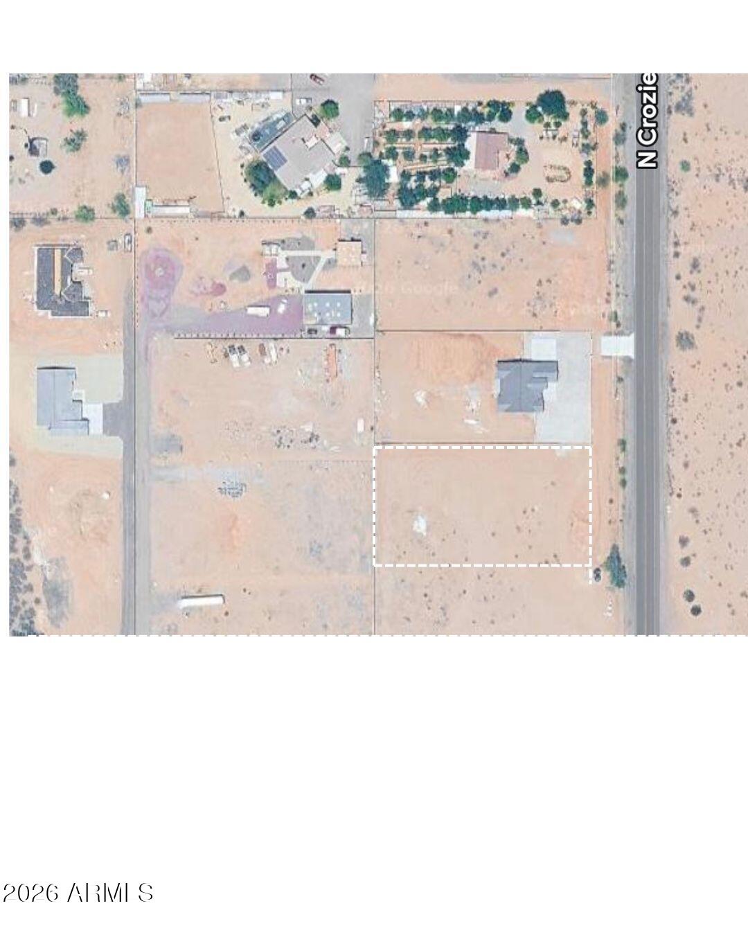Fantastic price and prime location in Wittmann, AZ! This property presents an excellent opportunity for development with paved road access and nearby utilities. A block wall is already in place along the west perimeter, adding value and privacy. Enjoy stunning mountain views, creating the perfect setting to build your custom home or invest in a growing area. APS transformers are located on the corner for added convenience. No HOA per owner and CCRs. Deed restrictions require a minimum 2,600 sq ft home. Don't miss out on this great opportunity!