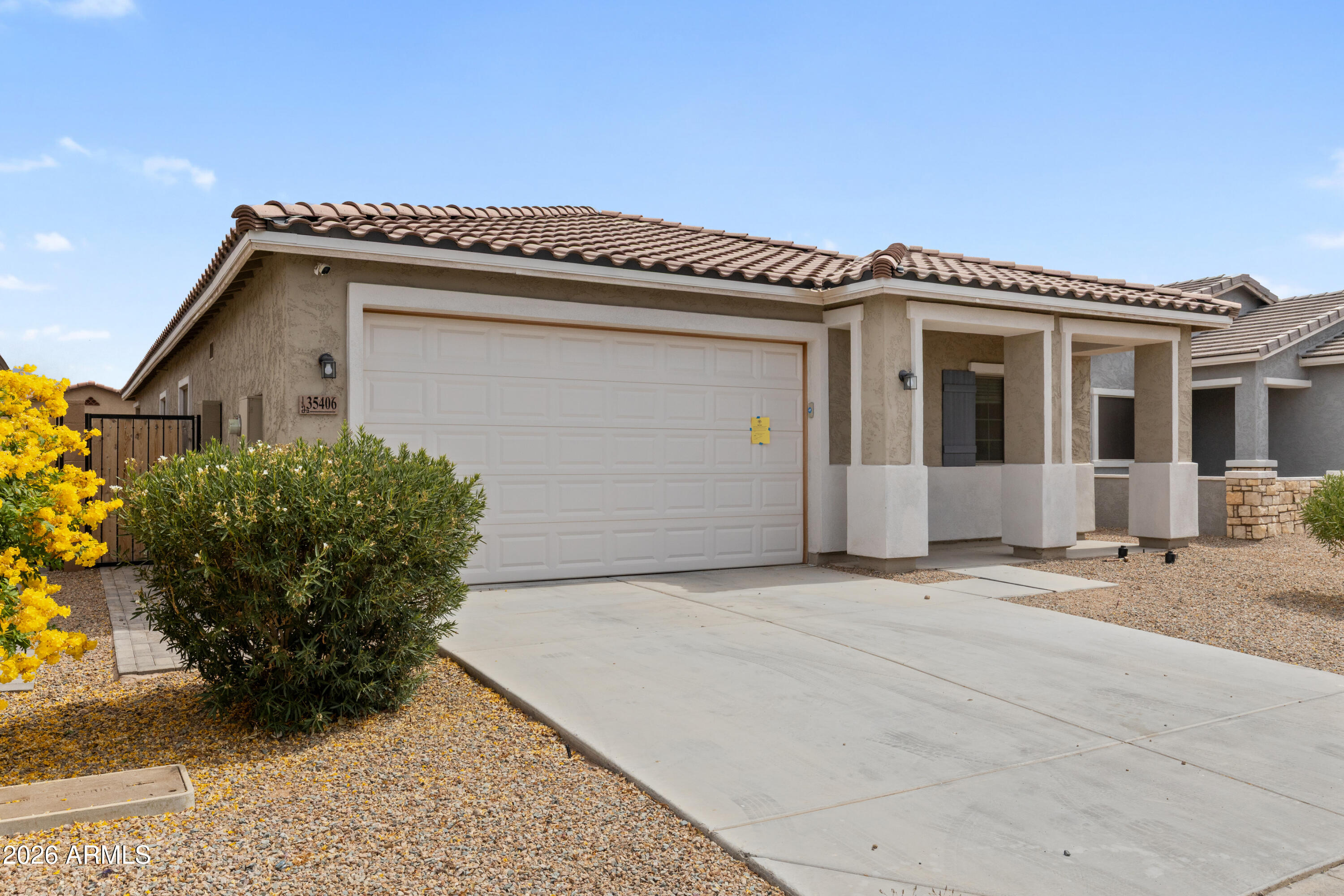 Recently refreshed and ready for a new family! Live the lake lifestyle in this spacious 5-bedroom, 3-bath home nestled in a serene lake community! Boasting 2,031 sq ft of living space with soaring ceilings and a bright family room, this home is designed for comfort and versatility. The master suite features a full bath and walk-in closet, while the kitchen offers granite countertops, pantry, and refrigerator included. Enjoy a low-maintenance yard with gravel landscaping and a 2-car garage for convenience. Perfect as a primary residence or an income-producing rental, this family-friendly community also offers playgrounds, walking paths, and more!