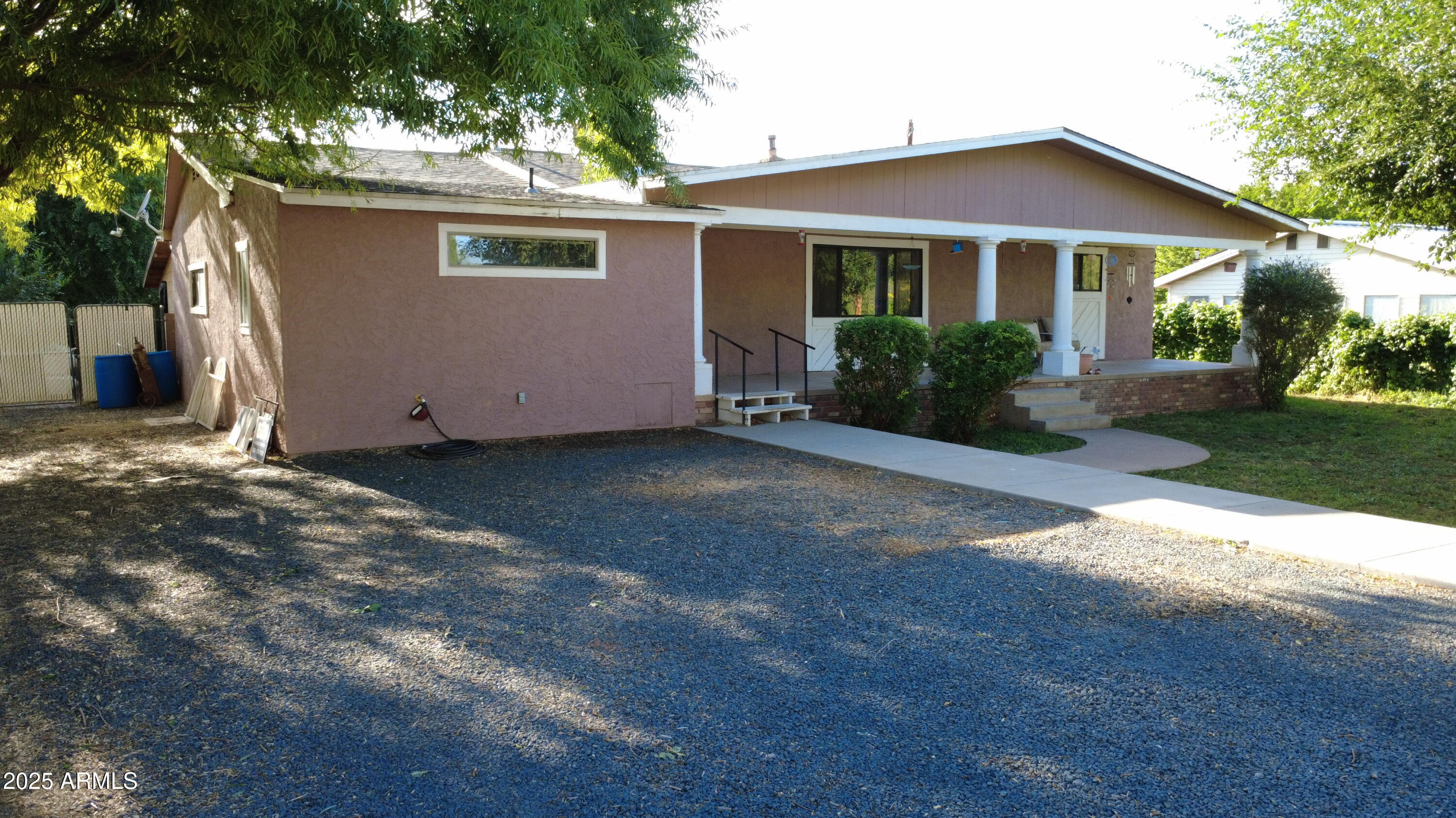 Spectacular 5bd 2ba home in the heart of Snowflake! Wide open floor plan with huge primary bedroom and spacious basement. Tons of storage, perfect for a large family. Prime location right across the street from the new public pool and the schools. Grandfathered irrigation water rights! Large 10x30 aviary and chicken coop with 8 laying hens, large garden with tons of fruit bearing trees and grapes, 10x12 shed. Roof was just replaced in July 2025! Very cozy and well taken care of home. Great neighborhood with a very loving community. One of the owners is a licensed real estate agent in the state of AZ and also the listing agent.