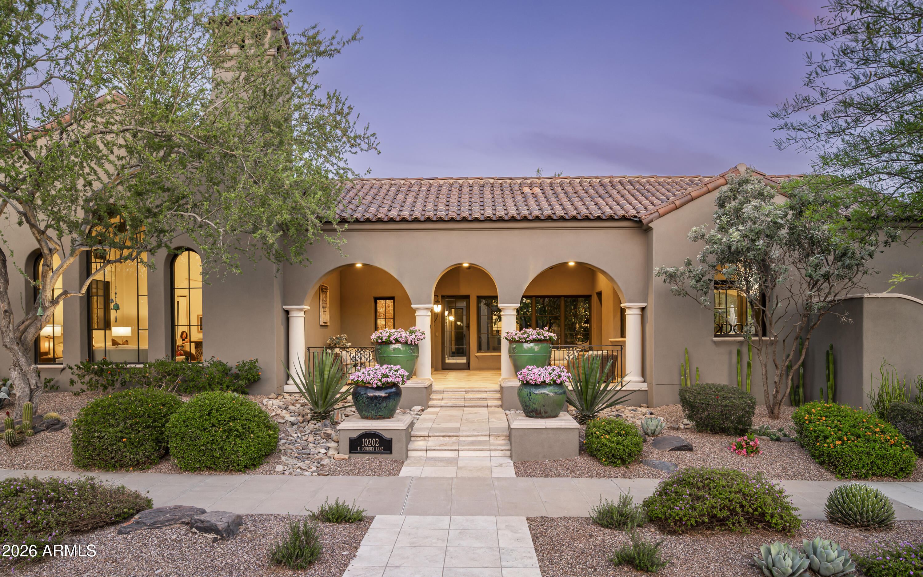 Positioned on an oversized corner lot on Silverleaf's Homestead Park, this extensively reimagined Salcito home combines timeless Silverleaf architecture with years of thoughtful, high-quality improvements. From the moment you enter, the attention to detail is evident withnew flooring, designer lighting, custom window treatments, updated fireplaces, and carefully curated finishes throughout. The kitchen was designed for those who love to cook, entertain, and gather. Anchored by striking quartzite countertops, it features a suite of Wolf and Sub-Zero appliances-including a wine fridge, dual dishwashers, Waterstone fixtures, and a dedicated coffee station with a sink and filtered hot water dispenser. The primary suite is a private retreat, with a renovated bath featuring Carrera gold marble, custom cabinetry, new shower and flooring, upgraded closet systems, and a spa-like atmosphere throughout. Two additional generous on-suite bedrooms, one with a private patio complete the home.

Outside, the property truly sets itself apart. The resort-style courtyard underwent a complete transformation with the addition of a spa, resurfaced and retiled pool, updated landscaping-including irrigation, artificial turf, and a four-hole putting green. The iconic Cocktail tower- one of only two on the street- offers sunset views, a wet bar, refrigeration draws, fireplace, and an unforgettable setting for evening entertaining. A covered cabana with gas lamps, heater, and an additional fireplace extends outdoor enjoyment year-round.

Additional highlights include a comfortable front porch, separate flex space/studio room, separate guest casita, newer HVAC systems, whole-home water filtration, Sonos audio, Unifi enterprise-grade networking, Multiple EV charging outlets and upgraded security systems.

With its exceptional craftmanship, extensive enhancements, and remarkable outdoor amenities, this residence presents a rare opportunity to enjoy one of Silverleaf's Parks most compelling offerings.