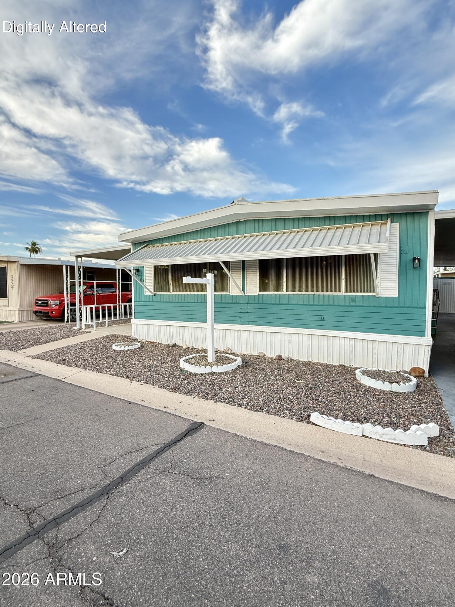 Opportunity awaits! This 3-bedroom, 2-bath double-wide manufactured home in a 55+ community offers plenty of potential for the right buyer. Featuring a spacious floor plan and generous living areas, this property is ready for renovation and is being sold strictly AS-IS. Whether you're an investor, flipper, or buyer looking to create your own vision, this fixer-upper presents an opportunity to build equity and customize the home to your needs and style. Bring your tools and imagination--this property offers endless possibilities!