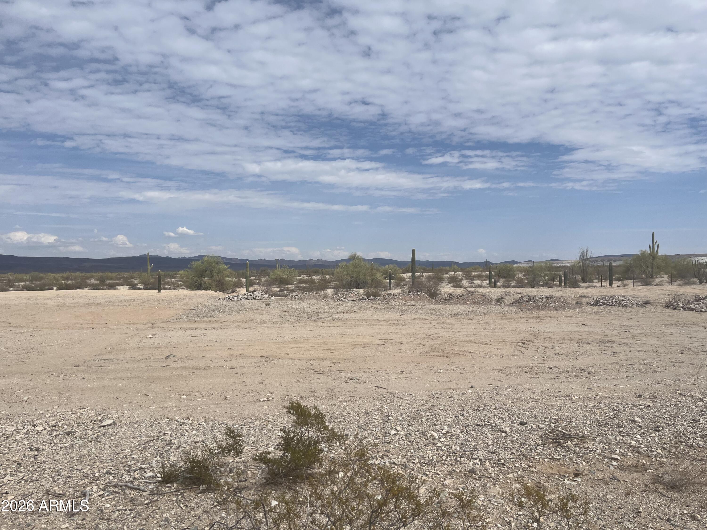 Cleared and professionally surveyed 1-acre parcel located north of town. The property offers an excellent build site with **eastern mountain views and open desert surroundings. Water and electric are adjacent to the property for convenient hookup.  

A ready-to-build lot with easy access and a head start on site preparation.