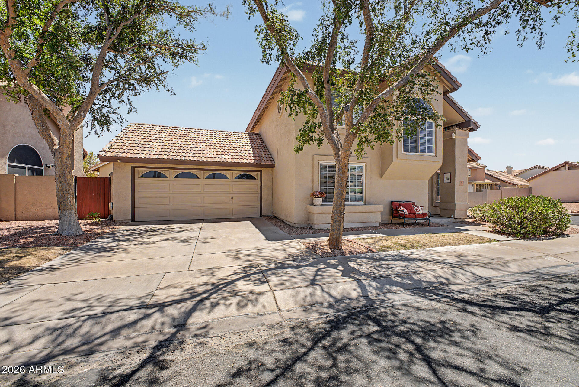This beautifully updated 2-bedroom + loft residence combines modern efficiency with high-end finishes in the desirable Keystone community. Situated on a corner lot directly across from the community pool, this home offers mountain views. sought-after north/south exposure, and a functional split floor plan with one bedroom downstairs and one upstairs for added privacy. The HOA maintains the front yard landscaping, providing easy, low-maintenance living. Major mechanical and structural upgrades provide peace of mind, including a new A/C (2025) and a new roof section around the chimney (2025). Inside, the home has been transformed with fresh interior paint, wood-look tile flooring, white baseboards, and the removal of all popcorn ceilings for a sleek, contemporary feel. The heart of the home features a modernized kitchen with soft-close cabinetry, Corian countertops, and an updated sink. Both bathrooms have been fully refreshed with new vanity tops, fixtures, and custom shower surrounds. Outside, the property benefits from a new drip irrigation system, ensuring a low-maintenance landscape. Don't wait!