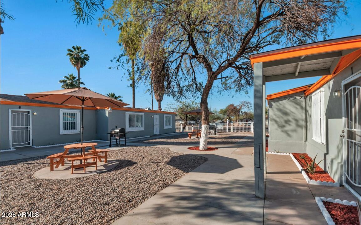 Discover a prime investment opportunity in strong central Phoenix with this fully occupied 8-unit multifamily complex generating consistent cash flow from day one. This exceptional property comprises three spacious 1-bedroom, 1-bathroom units and five efficient studio units, perfectly positioned to capitalize on the area's high demand for affordable rentals where vacancies remain rare. Each unit features its own electrical sub-panel for independent metering and billing. While all three 1-bedroom units boast in-unit washer/dryers for premium tenant appeal, and studios share a convenient on-site laundry facility. The property is fully fenced with one dedicated parking spot per unit, creating a secure and organized community. Major systems including plumbing, electrical, and HVAC were professionally upgraded in 2021, ensuring reliability and minimal maintenance concerns for years to come. The property is well-maintained with regular upkeep including fresh paint and timely repairs. With its R-5 zoning allowing for maximum density in multifamily development, this property presents significant future redevelopment possibilities for investors seeking long-term upside potential. Located strategically near Downtown Phoenix, the Central Avenue light rail extension, and with easy access to I-10 and I-17, residents enjoy quick commutes to key employment corridors and major transit routes. Beyond the stable current income, this is a true value-add opportunity--the large lot provides room for expansion, and there's strong potential to increase returns by replacing flooring and installing washer/dryers in the remaining studio units, or utilizing the huge courtyard for income-producing amenities like vending machines. This combines built-in stability with substantial upside for an investor ready to maximize returns. DRIVE-BY ONLY; please do not disturb tenants. Walkthroughs available only with accepted offers. Buyer to verify all information.