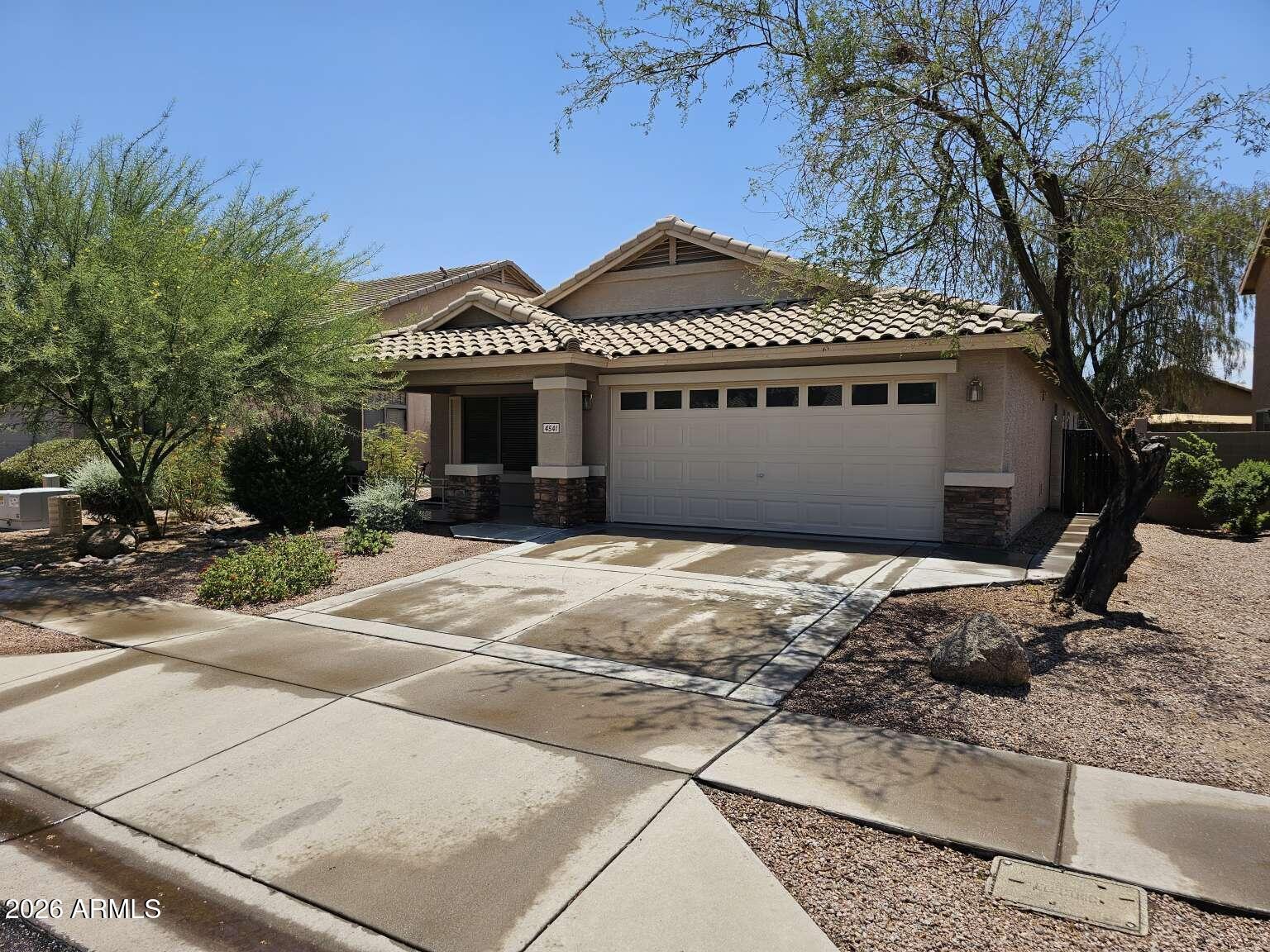 Single-story living in one of Laveen's most established communities -- Cheatham Farms! This well-maintained 3-bedroom + den home lives like a 4-bedroom and is the perfect fit for buyers seeking comfort, flexibility, and value all in one place. Step inside to a bright, open floor plan featuring 1,763 SF of thoughtfully designed single-level space. The versatile den is fully enclosed and large enough to serve as a 4th bedroom, home office, or playroom -- giving you the flexibility most buyers are searching for. Freshly painted throughout and featuring a brand new appliance package, brand new carpet, and ceiling fans in every room -- this home is completely move-in ready from day one. Out back, enjoy the covered patio with peaceful views toward the South Mountains -- a relaxing retreat after a long day. The 5,371 SF lot provides comfortable outdoor space with plenty of room to entertain. Additional highlights: 2-car attached garage, concrete tile roof, refrigerated air conditioning, and one of the lowest HOA fees in the area at just $71.92 / month. Low 2025 property taxes of $1,978 keep monthly costs exceptionally manageable. Minutes from the 202 Freeway, top-rated Laveen schools, and everyday shopping and dining. Come see this property today!