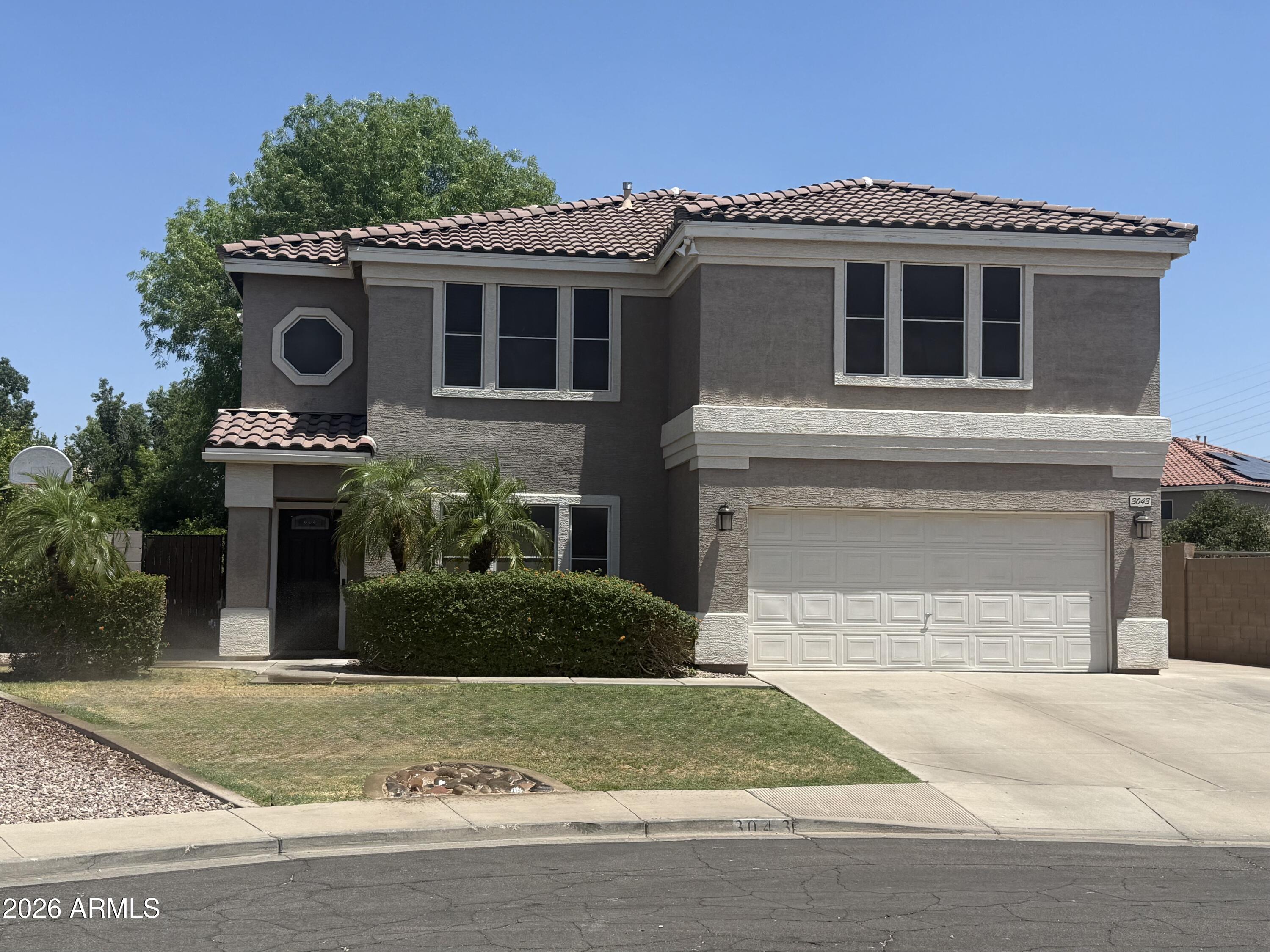 Opportunities like this rarely come available in east Mesa. This beautifully updated 4-bedroom home sits at the end of a quiet cul-de-sac on a rare oversized 0.28-acre lot in Boulder Creek Subdivision, directly adjacent to a community park--offering space, privacy, and a setting that home owners truly value.
With 2,757 square feet, this home features a highly functional layout designed for both everyday living and gathering. Enjoy a formal living room, a spacious family room, and an open kitchen great room that naturally brings everyone together. Upstairs includes four bedrooms, two full baths, loft, an enclosed TV room and a flexible office space--perfect for growing families, remote work, or multi-use living.
A major renovation in 2017 brought extensive upgrades, including new granite kitchen countertops, updated flooring throughout (tile and carpet), and a fully refreshed pool with new
pump/filter. Additional improvements include a full roof tile R&R (2019), new HVAC system
(2020), and a large covered patio added in 2021 that spans the back of the home--creating a
seamless indoor-outdoor lifestyle.
The backyard is where this home truly shines. Designed for both relaxation and fun, it features a
private fenced 16x32 pool, basketball court, mini-golf course, and a fully landscaped grass
yard--an ideal space for kids, entertaining, or simply enjoying Arizona evenings. A 12x16 fully
finished air conditioned workshop (2018) offers additional flexibility for hobbies, storage, or
creative space. The property also includes an RV gate and additional side parking.
Inside, you'll find 9' ceilings downstairs, crown molding throughout, window trim on all windows,
and a huge walk-in pantry--details that add both comfort and character. A 2-car garage
completes the home.
Owned solar panels help reduce energy costs, whole-house water softener, reverse-osmosis
drinking water.
Located just 1 mile from the Loop 202 freeway, this home offers convenient access to shopping,
dining, and commuting routes while still maintaining a quiet, neighborhood feel.