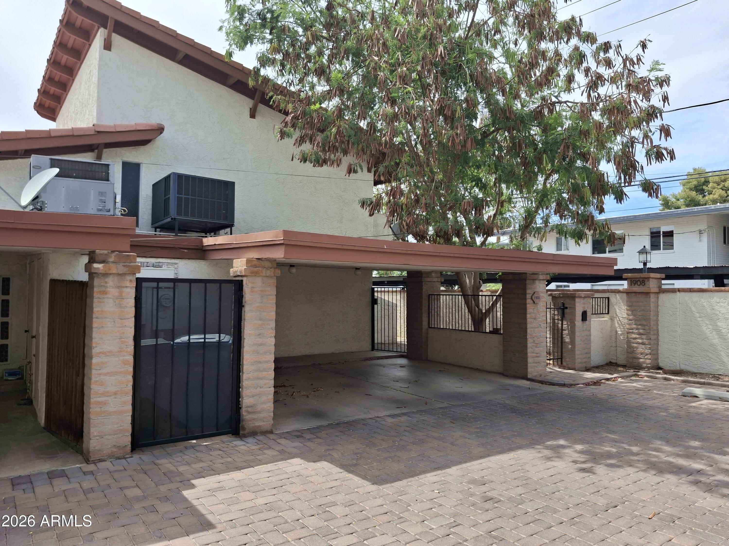 Whether you are looking for a savvy investment property or a primary residence in the heart of everything, this Biltmore gem is a rare find! Located in a highly desirable neighborhood, this north/south-facing townhouse offers an optimal layout designed to maximize space and functionality. Major systems are already updated with an almost-new A/C and water heater, giving you ultimate peace of mind. Features a private enclosed courtyard perfect for outdoor relaxing, a 2-car carport, and remarkably low HOA fees. The community boasts a sparkling pool and cabana. Just minutes from elite dining and shopping, this unit needs fresh paint and a little updating--bring your personal touch and build instant equity in a prime location!