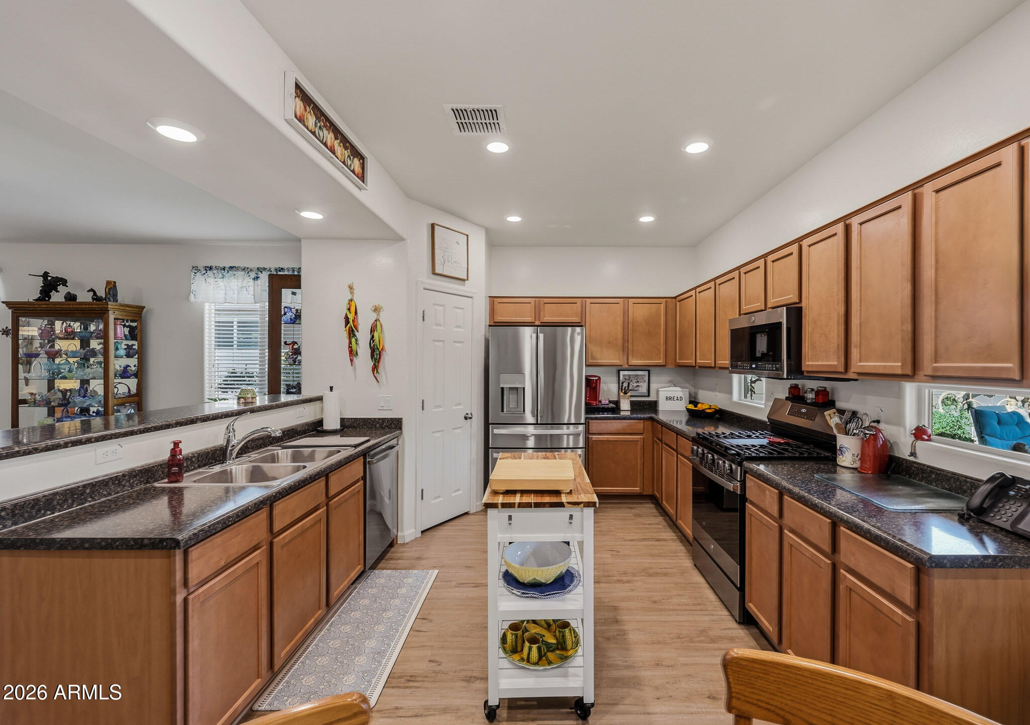 Average ELECTRIC BILL is ONLY $36/mo! Even with the assumable $70/mo solar lease, this Blue Horizons home keeps energy costs low all summer long. Tucked into one of Buckeye's fastest-growing West Valley neighborhoods near the I-10 & Verrado Way corridor, this move-in ready stunner offers a smart split floor plan, an open great room full of natural light, and a spacious eat-in kitchen with breakfast bar & newer appliances. Retreat to a roomy primary suite with double-door entry, dual sinks, walk-in shower & oversized closet. The secondary bath's dual-entry layout adds privacy where you want it. Out back: covered patio & easy-care desert landscaping. Shopping, dining, parks & freeways minutes away. Owned solar paid off at close. This one checks every box. Come see it before it's gone! Positioned near one of Buckeye's major development and retail expansion areas, residents enjoy convenient access to shopping, dining, entertainment, parks, and commuter routes while still enjoying a neighborhood feel.

The split floor plan offers added privacy, with a spacious primary suite and three additional bedrooms providing flexibility for guests, home office space, workout room, hobbies, or multigenerational living. 

Step outside to enjoy Arizona outdoor living with a covered patio backyard, low maintenance lush landscaping, artificial turf, and space to relax, entertain, or enjoy evening sunsets.

Blue Horizons is conveniently located near I-10, Verrado Way, shopping centers, restaurants, parks, schools, and continued West Valley growth and development. The surrounding Buckeye area continues to see major expansion in retail, entertainment, healthcare, and infrastructure, contributing to strong long-term appeal and convenience for homeowners.