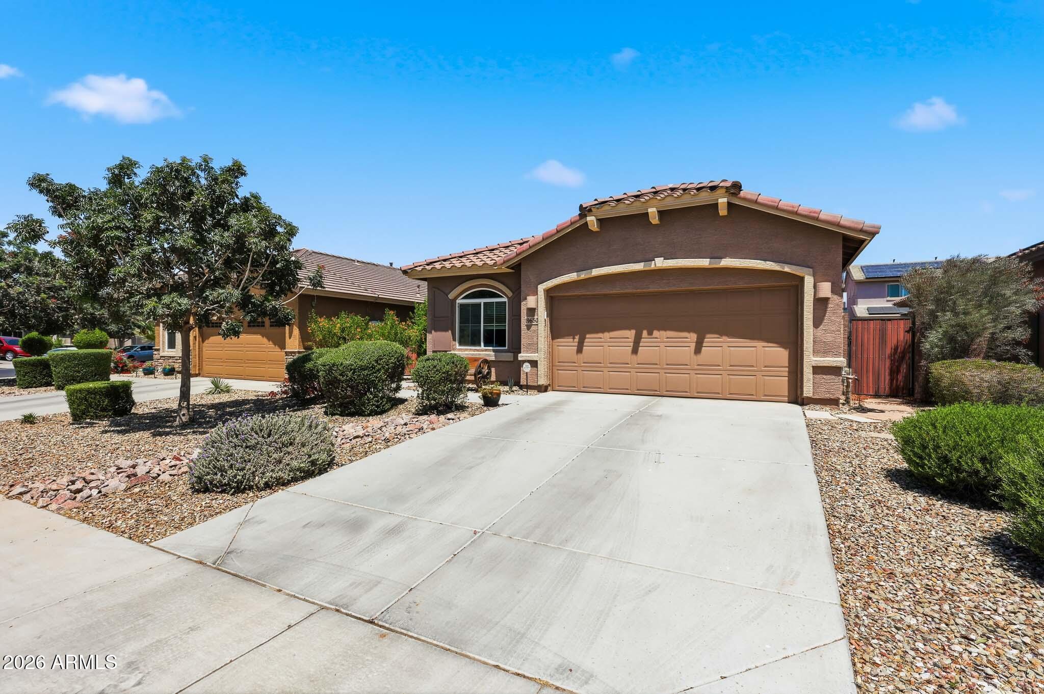Welcome to 19650 W Jefferson St in Buckeye's Blue Horizons community near the growing I-10 and Verrado Way corridor. Move-in ready 4 bedroom split floor plan featuring an open concept great room, natural light & spacious eat-in kitchen w breakfast bar & stainless appliances. Spacious primary suite offers double-door entry, dual sinks, walk-in shower & oversized walk-in closet. Thoughtfully designed secondary bath w dual-entry layout providing convenient access from both the hallway & bedroom wing for added privacy & functionality. Enjoy Arizona outdoor living with a covered patio backyard, low maintenance lush desert landscaping & convenient access to shopping, dining, parks & freeway access in one of Buckeye's rapidly growing West Valley areas. Positioned near one of Buckeye's major development and retail expansion areas, residents enjoy convenient access to shopping, dining, entertainment, parks, and commuter routes while still enjoying a neighborhood feel.

The split floor plan offers added privacy, with a spacious primary suite and three additional bedrooms providing flexibility for guests, home office space, workout room, hobbies, or multigenerational living. 

Step outside to enjoy Arizona outdoor living with a covered patio backyard, low maintenance lush landscaping, artificial turf, and space to relax, entertain, or enjoy evening sunsets.

Blue Horizons is conveniently located near I-10, Verrado Way, shopping centers, restaurants, parks, schools, and continued West Valley growth and development. The surrounding Buckeye area continues to see major expansion in retail, entertainment, healthcare, and infrastructure, contributing to strong long-term appeal and convenience for homeowners.