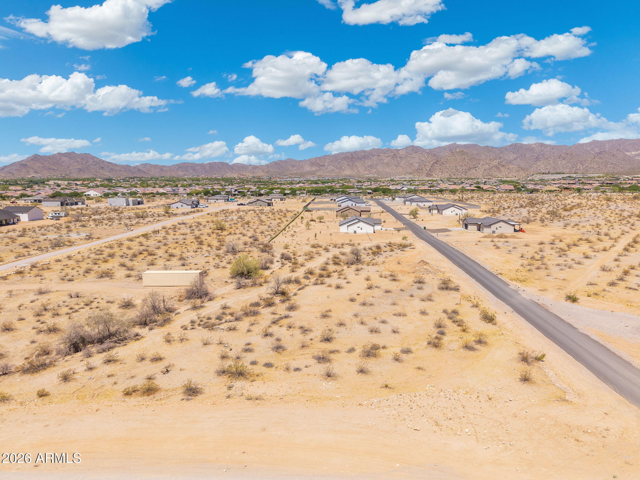 Exceptional opportunity to own a prime parcel in the rapidly growing Litchfield Park area! This build-ready lot features paved road access with electric and cable available at the property line, helping streamline your future development plans. Surrounded by expanding residential communities, new retail centers, dining, and commercial growth, this property is ideally positioned to benefit from the area's continued expansion. Whether you're looking to build your dream home, invest for the future, or develop, the possibilities are endless. Don't miss the chance to secure land in one of the West Valley's most promising growth corridors.