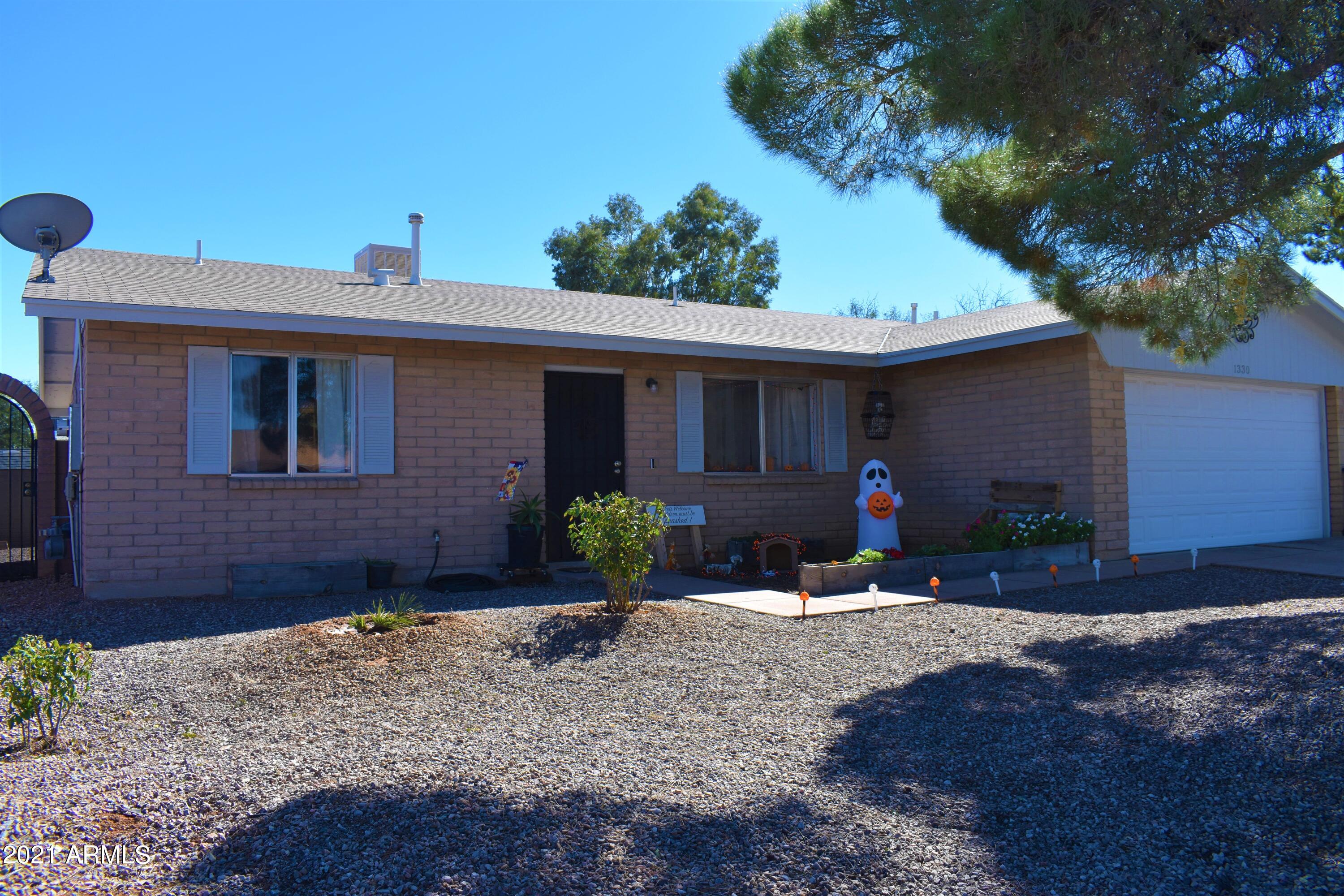 This ADORABLE home is MOVE IN READY!!
The Inside of the home has been nicely updated. All high traffic areas have beautiful wood look tile to include the master bathroom and one of the 3 bedrooms. Kitchen has been completely remodeled with Corian countertops. 42'' upper light grey custom cabinets, tons of lower cabinets and a built in pantry. You have plenty of counter space and storage in this gorgeous kitchen! Larger two car garage with extra storage. Large 50 gallon water heater. Newer furnace and newer evaporative cooler. RV gate with space to park a motor home or trailer, plus a separate 30 amp plug in . Backyard has so much character with the beautiful shade tree, grass, rose bushes and a Large patio to entertain. You don't want to miss this home, Call TODAY for your showing.