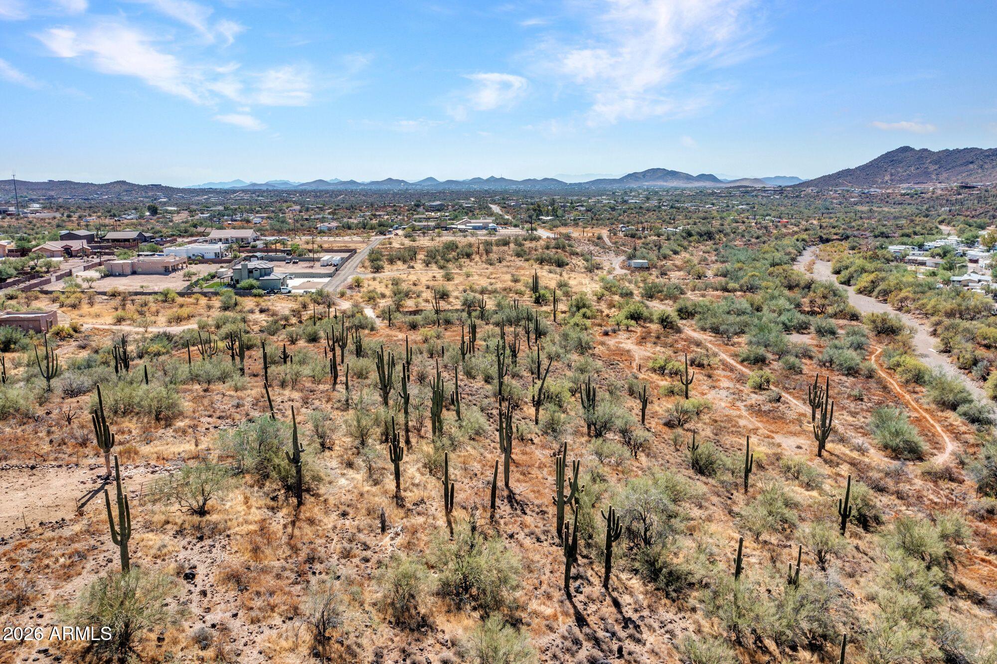 Ready to build your dream home? This elevated lot is perched perfectly for those jaw-dropping mountain and desert views you've been dreaming of! Imagine morning coffee with the sunrise over the Sonoran Desert and evenings soaking in desert colors that only Arizona can deliver. There's so much potential here—space for your custom build, privacy, and nature right at your doorstep. Whether you're planning a modern masterpiece or a cozy desert escape, this lot is the perfect starting point. Come walk it—you'll see why it's something special!