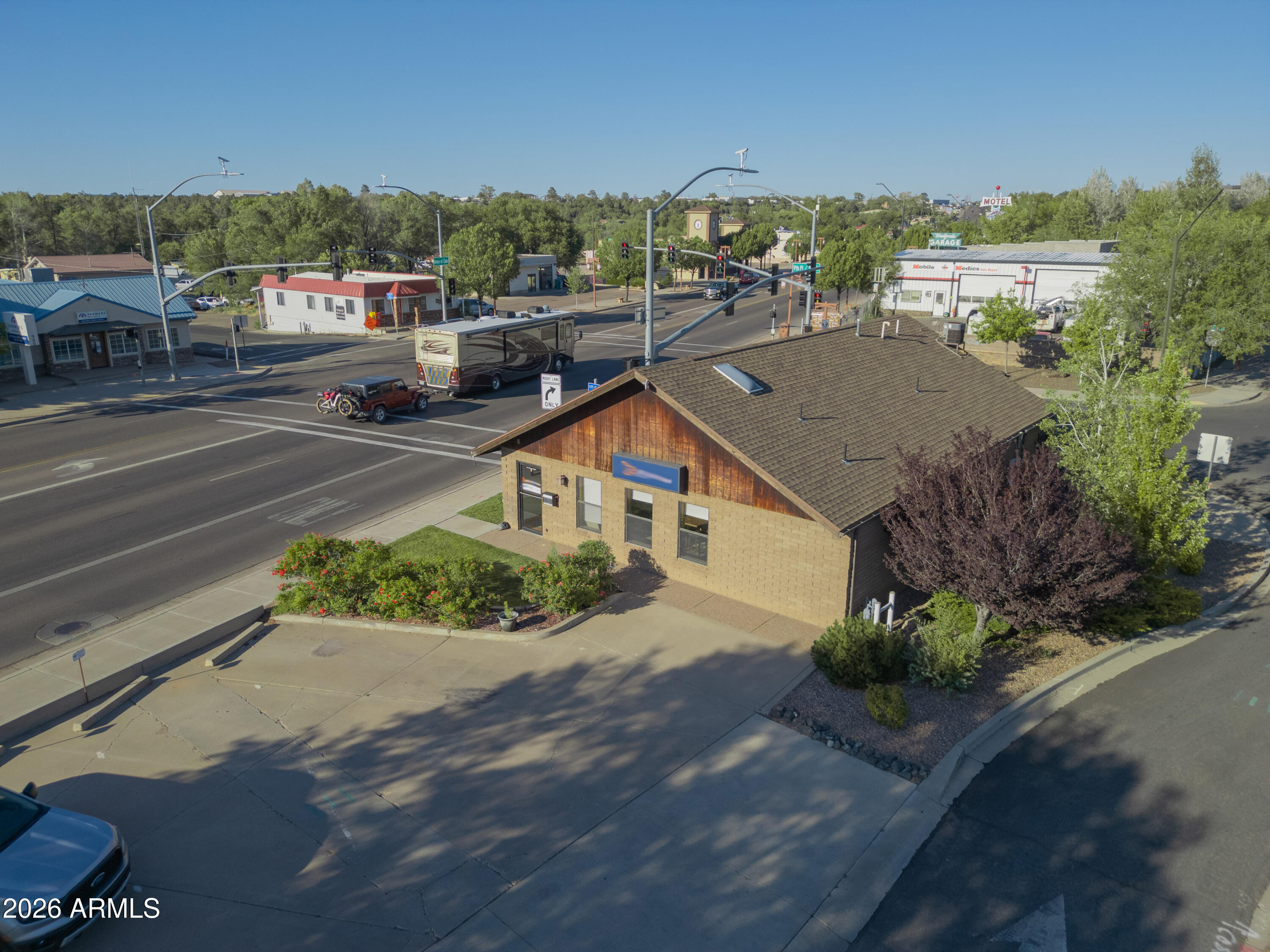 Awesome business opportunity right on the Deuce of Clubs in Downtown Show Low!  Close to events at Frontier Fields and City Hall, this convenient location will be sure to catch your customer's attention. 
Building is presently used for office use, but can be converted to medical or food service. Buyer to verify permits with the City of Show Low for any new business changes at this location.
2 parcels 210-14-052 and 210-14-053