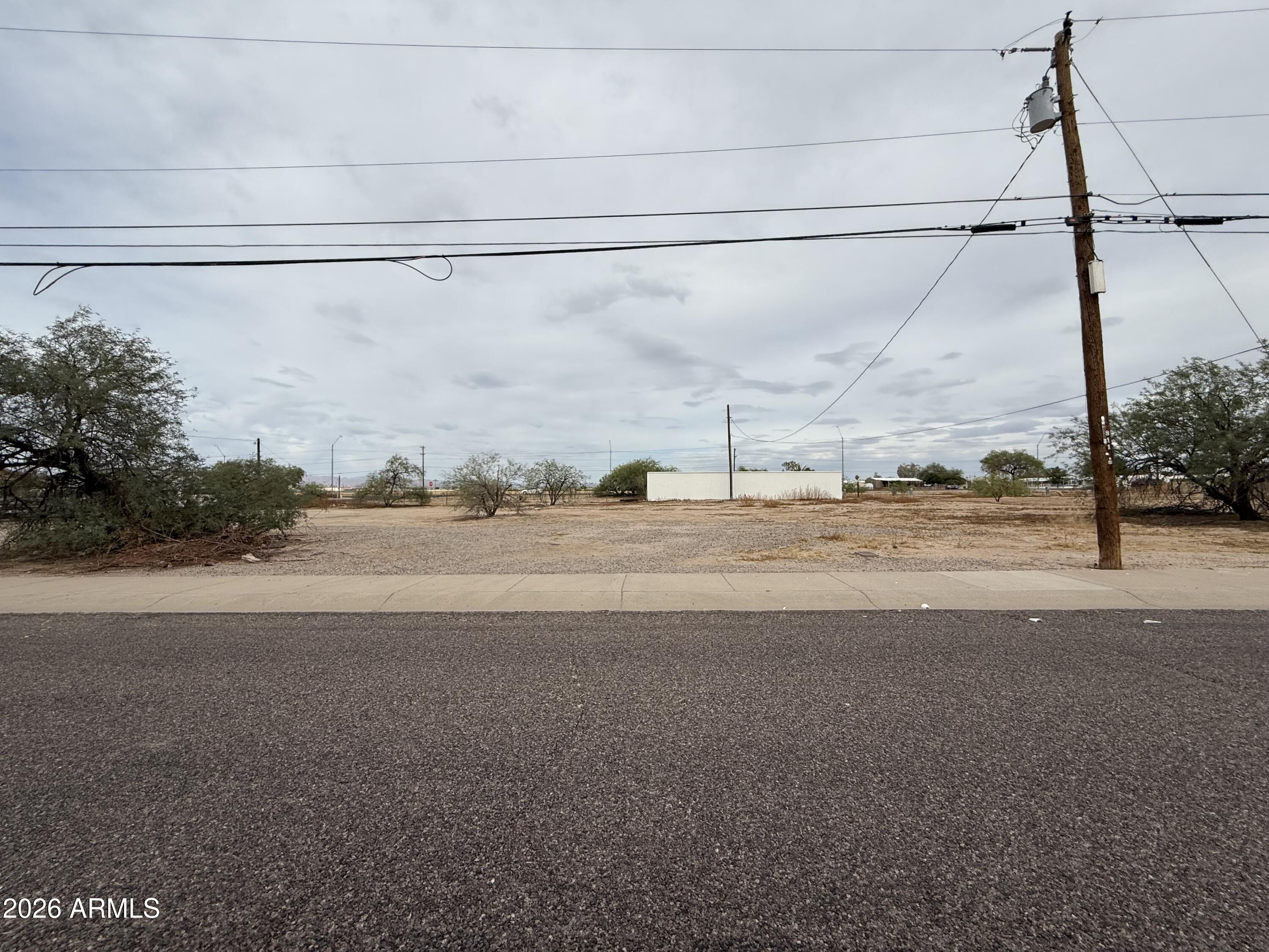 19,358 square foot corner lot. Additional surrounding parcels also for sale. Please inquire on a potential package deal. All utilities to the lot. The contiguous parcel is zoned commercial with Hwy frontage offering possible re-zoning and development opportunities.