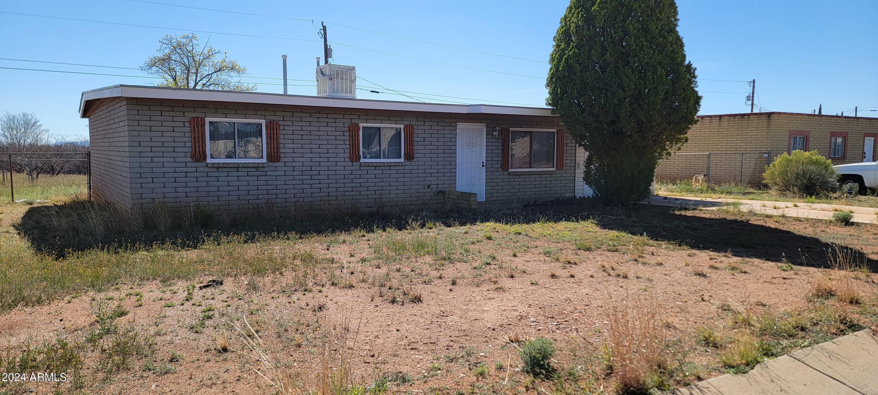 This home has been very well maintained by the owners of many years. They had the roof recoated as well as having new windows installed a few years back. This home has a very popular floor plan and flows well. The main bath is handicap accessible.  is a good sized backyard with chain link fencing. It also backs up to a large open area so no neighbors behind you. There is also a 1 car garage and long driveway as well as room to park an RV on the side. Call to see this one before it is sold!