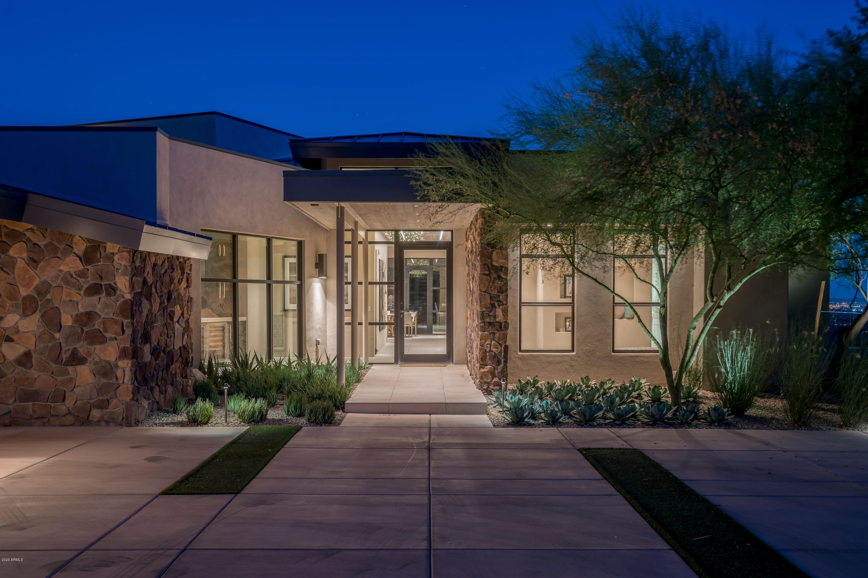 Up High on one of the Clearwater Hills in PV you will find an Oasis!
This Stunning Soft Contemporary Home Perched on a 1.13 acre Hillside Lot with just over 5,081 sq.ft.,
is the Perfect ''Right Size''.  The Home Features 4 Bdr/,office, 6 Bths , a 4 Car Garage with Fabulous Finishes, Views and a Split Floorplan that will not Disappoint! The Home was Gutted without Moving Walls and Restored with Sophistication that Inspires Resort Zin... Think  Amangiri!
The Ceiling and Tiled Powder Room Wall are Reclaimed Teak from Indonesia, Plaster Walls throughout
Limestone on numerous Countertops, except the Master which is Carrera Marble. Kitchen Countertops are Limestone/ Spekva Wood from Sweden. This South Facing Home has
Misted covered Patio,Negative Edge Pool,Spa and Firepit with Breathtaking