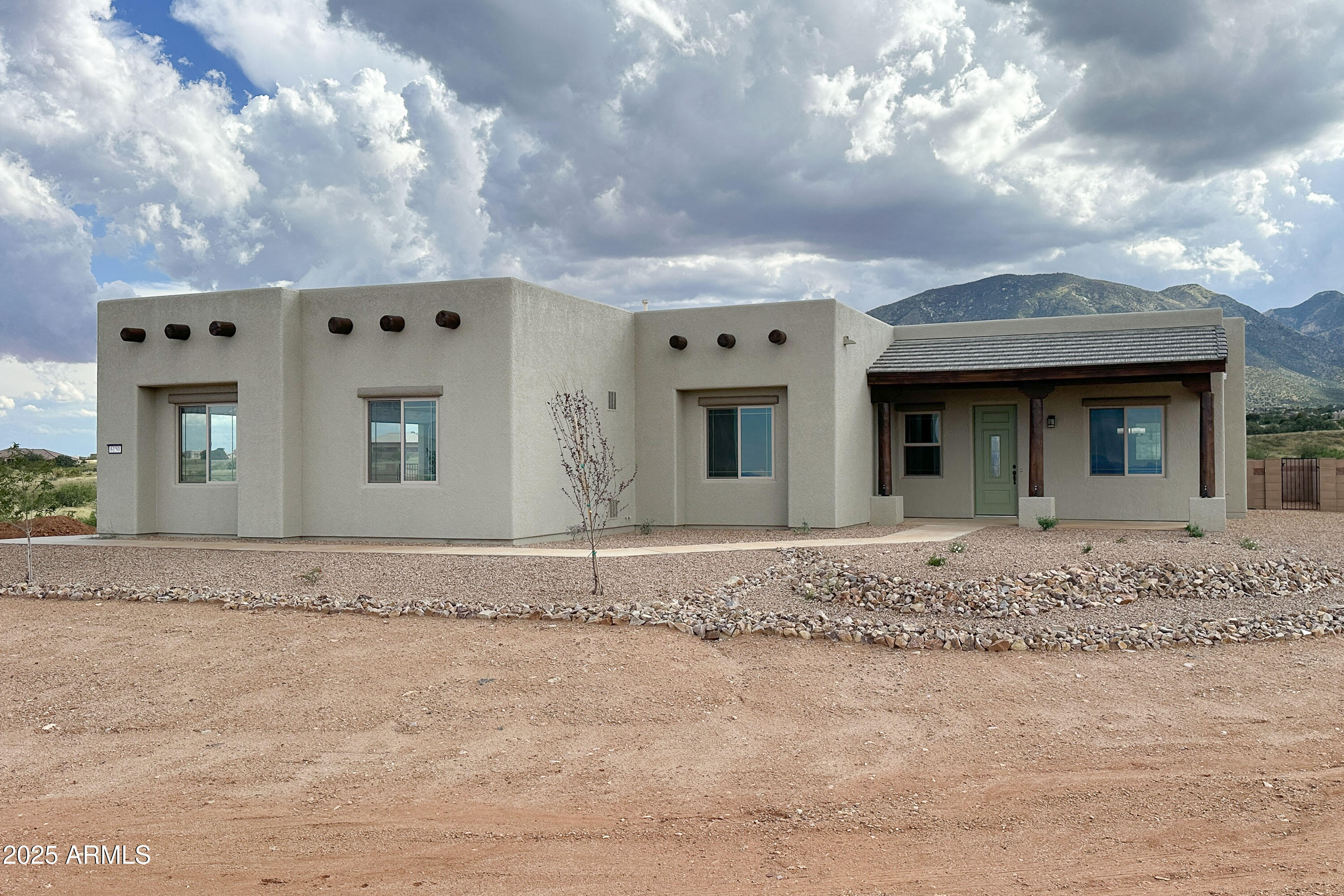 Enjoy stunning mountain views from this 2278sqft home on over 3 acres in the popular Wild Horse/Three Canyons community. Featuring wood-look plank tiles, maple cabinetry with soft close doors and drawers and pot drawers, custom granite & quartz countertops, along with a 36'' cooktop, wall oven and microwave, and venthood. Upgraded carpet and pad in bedrooms. Don't miss out on several other custom features - truly a must see! Environments for Living Certified home.