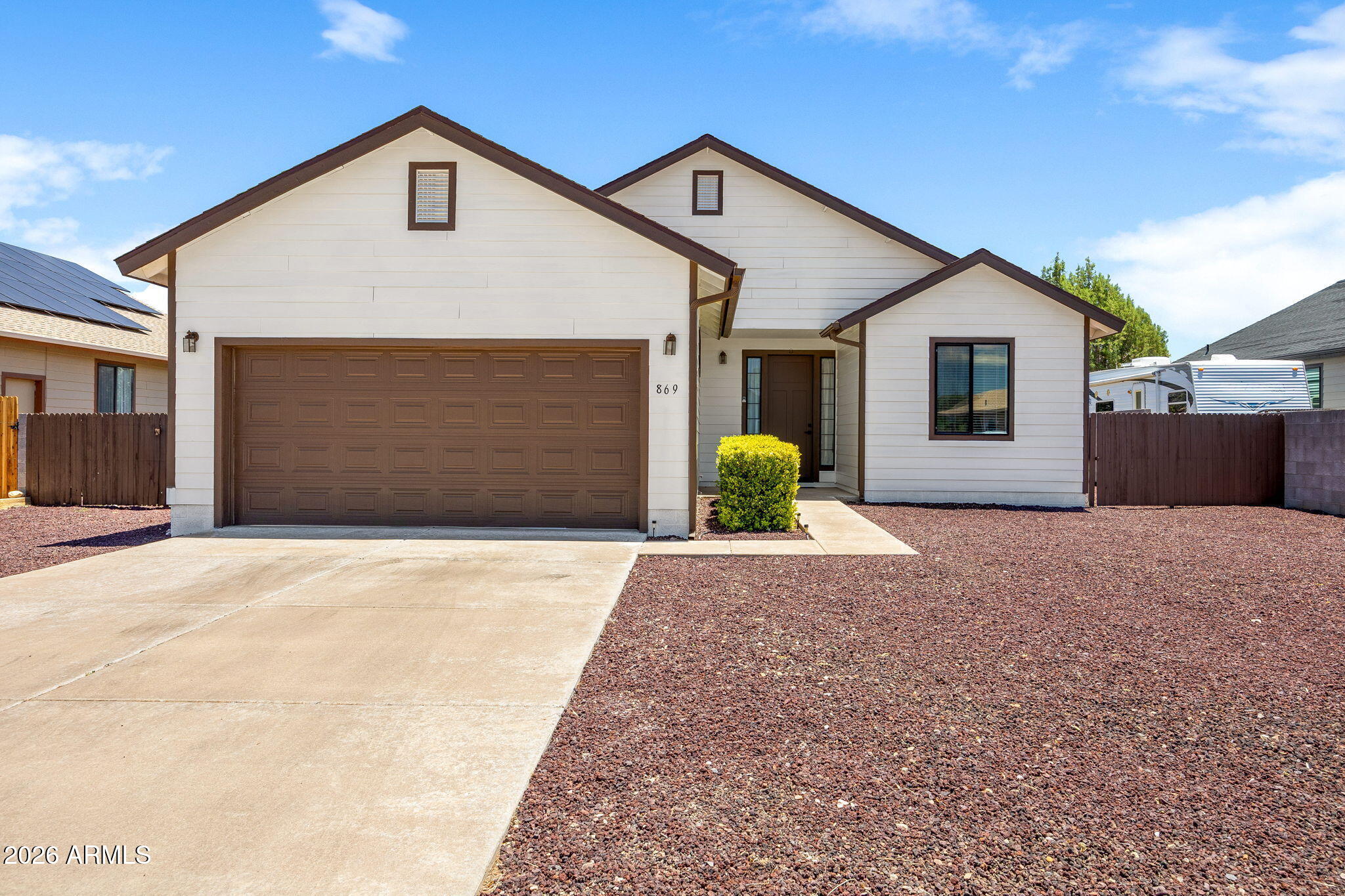 Centrally Located Show Low Gem - Move-In Ready with No HOA! Welcome to your perfect high-country retreat. Step inside to an expansive, highly functional 1,256-square-foot living space highlighted by dramatic 15-foot vaulted ceilings that make this 2-bedroom, 2-bathroom layout feel exceptionally bright and open. The seller has taken care of the big-ticket items so you don't have to, including a brand-new roof, a fresh exterior paint, and a brand-new washer and dryer set included with the sale. The exterior is designed for easy mountain living. Enjoy a low-maintenance front yard for easy living as well as a convenient on property RV parking. The backyard features durable masonry walls, low-maintenance landscaping as well as a great, manicured lawn perfect for your pets or children to play safely. Situated in a central neighborhood with no HOA, you are just a short drive from local dining, shopping, and outdoor recreation.

Key Features
" Brand New Roof: Full peace of mind for years to come.
" Fresh Exterior Paint: Excellent curb appeal and crisp look.
" 15-Foot Vaulted Ceilings: Incredible, airy interior volume.
" New Washer & Dryer: Included brand-new appliances save you money.
" Fully Fenced Backyard: Secure masonry walls for ultimate privacy.
" Kid & Pet Friendly: Dedicated small grass area in back.
" Low-Maintenance Front: Lock-and-leave landscaping saves time.
" Prime Location: Minutes from local stores and restaurants.
" No HOA: Park your toys and live without restrictions.

Whether you are looking for a reliable starter home or a cozy second-home weekend escape, this property delivers.