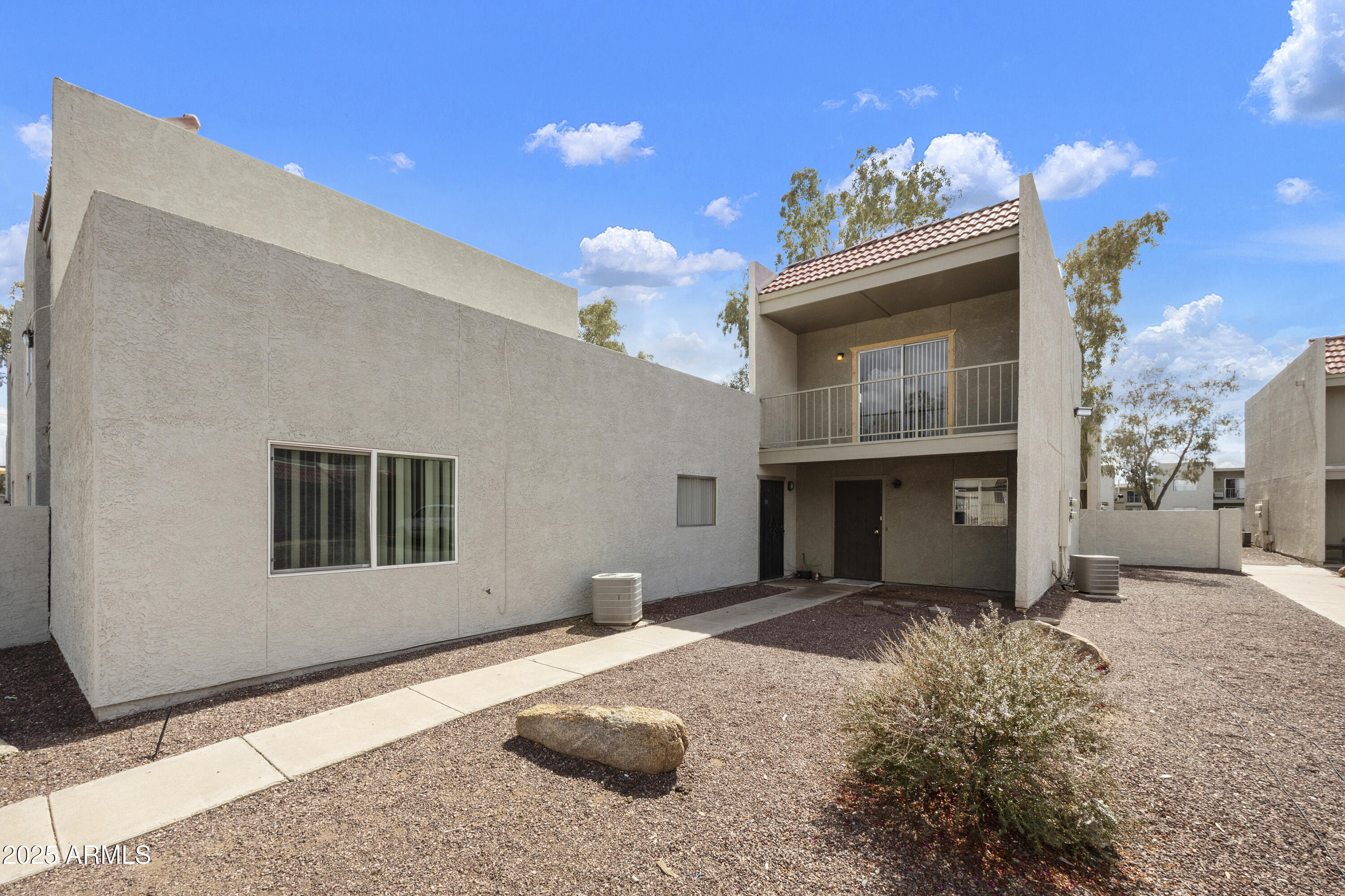 Great investment opportunity in the highly desirable gated community of Palomino Point! This 4-plex is situated in a single building and features an excellent unit mix consisting of a 3 bed/3 bath, a 2 bed/2 bath, a two-story 2 bed/1.5 bath, and a spacious 1 bed/1 bath. All units have received full to partial remodels, including new flooring and newer appliances. The HOA covers water, sewer, trash, and landscaping, while electricity is individually metered to each unit. Additional features include a private patio with a second-floor balcony. Residents enjoy access to the community pool, heated spa, and playground. Ideally located across the street from a school and just minutes from shopping and public transportation. Buyer to verify all information.