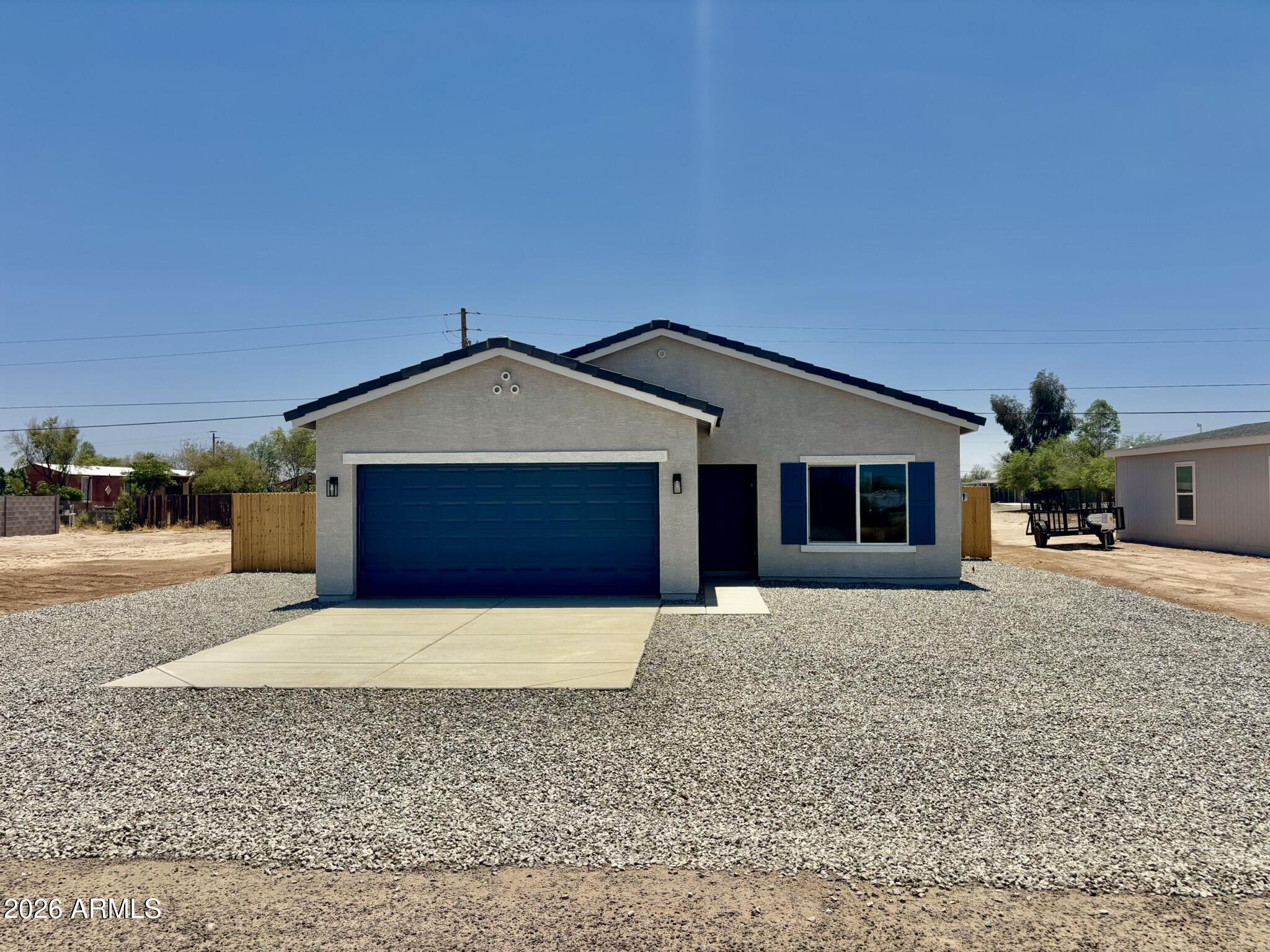BRAND-NEW HOME! **Move-in Ready** This thoughtfully upgraded home offers modern finishes and energy-efficient construction designed for comfortable Arizona living. Enjoy beautiful luxury vinyl plank flooring throughout - no carpet - gorgeous quartz countertops, upgraded stainless steel appliances, energy-efficient windows, spray foam insulation for year-round comfort, and upgraded exterior wall construction for added durability and noise reduction.

No HOA. Conveniently located just minutes from Casa Grande's shopping, dining, and everyday conveniences. This home also qualifies for USDA financing with $0 down for eligible buyers, plus the seller is offering an interest rate buy-down.