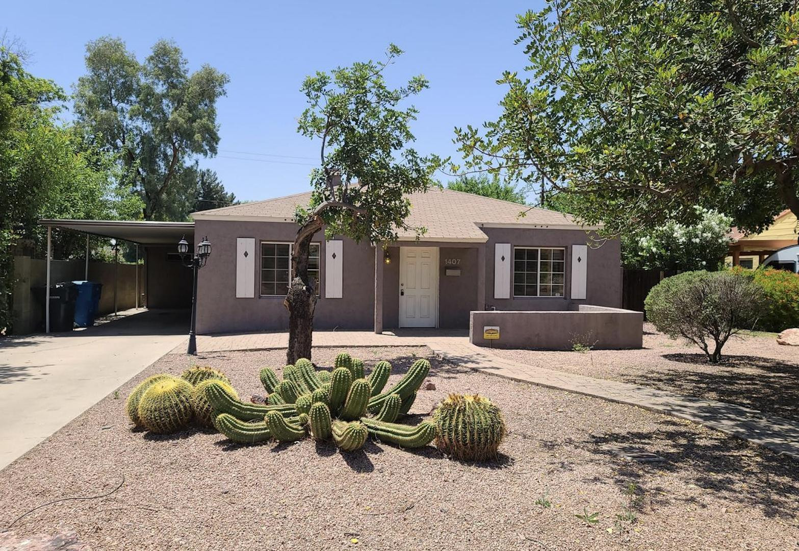Live in the heart of the highly sought-after Woodlea Historic District, a charming neighborhood known for its tree-lined streets, historic character, and strong sense of community. Located near the Melrose District, this area offers convenient access to popular local dining, shopping, and entertainment while maintaining a unique neighborhood feel in central Phoenix. This tastefully updated bungalow features 2 spacious bedrooms plus a flexible office/den space, an open floor plan and abundant storage, .  A rare opportunity to lease a home full of charm, character, and modern comfort.