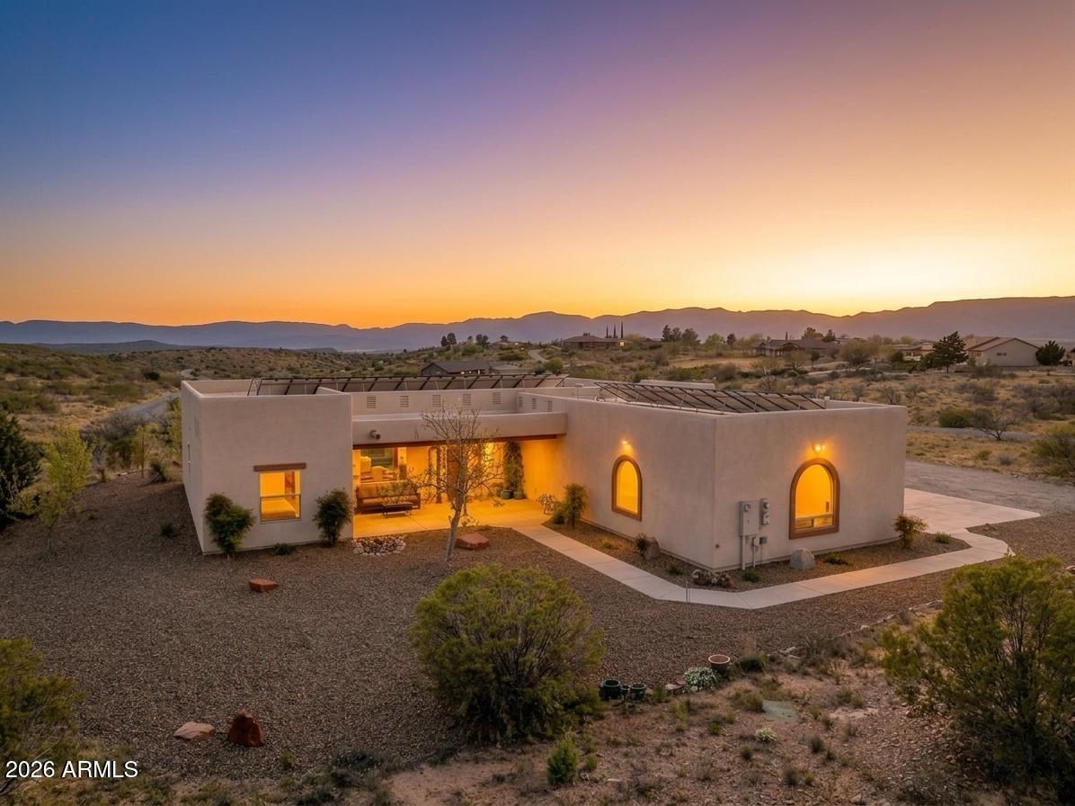 Refined, private, and completely dialed in, this thoughtfully upgraded Cornville retreat offers a rare blend of peace and move-in-ready perfection. Set against a serene backdrop, this home features major recent system investments including a new roof (2024), new well pump with warranty (2025), new water heater (2024), owned solar, and pristine HVAC maintenance. Beautiful interior updates boast full inside/out paint (2024), designer lighting, custom window coverings, updated bedroom flooring, and a remodeled primary suite with a Kohler smart toilet and custom closet system. Low-maintenance grounds feature new landscape rock (2026). Offered with a curated selection of furnishings for a seamless, turnkey lifestyle! Whether you're seeking a full-time residence, a refined second home, or a turnkey investment, this property delivers a rare combination of upgrades, ease, and tranquility--with nothing left to do but enjoy it.