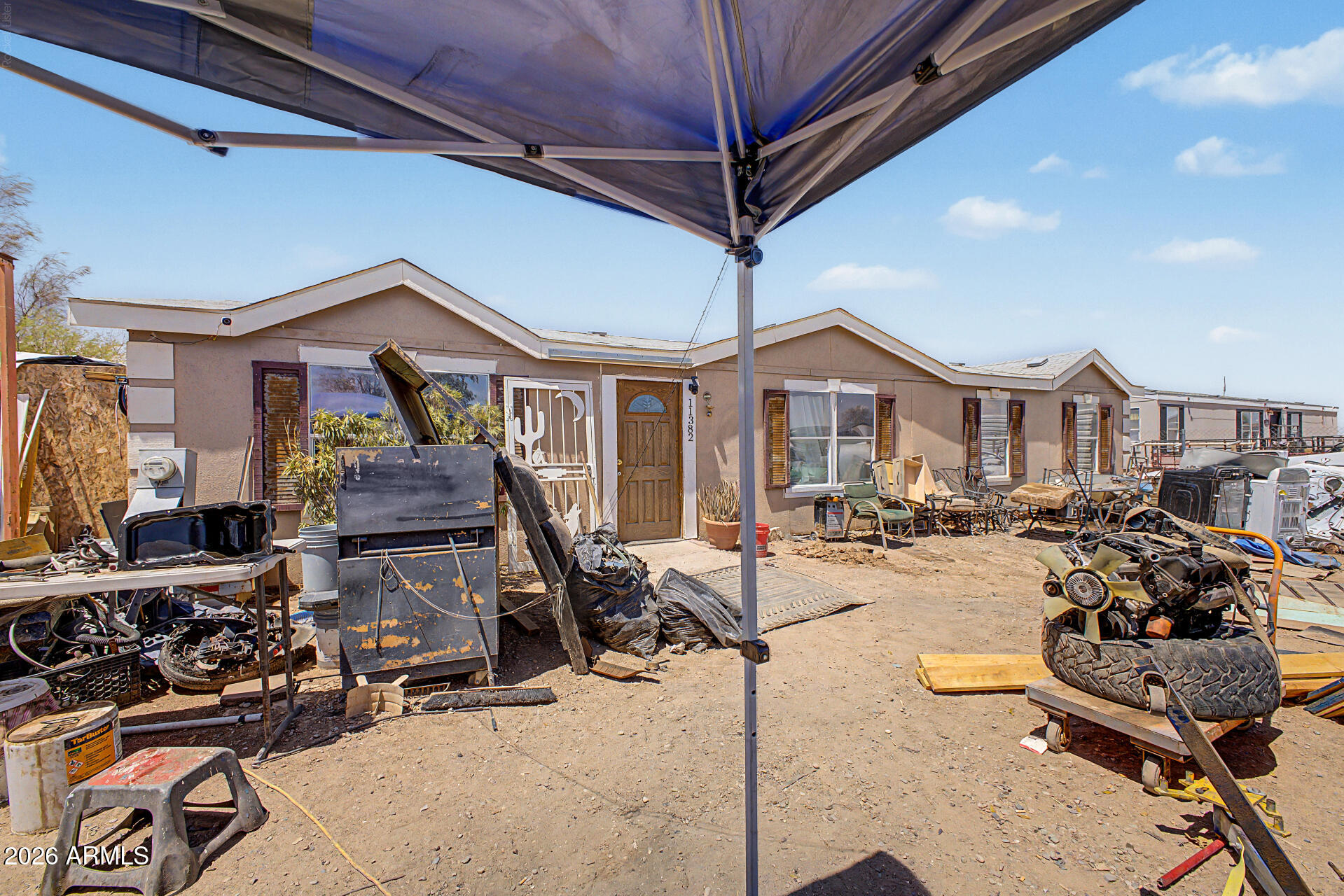 INVESTOR OPPORTUNITY!!  This 4 bedroom 2 bath ground-set home has lots of potential.  Located 10 minutes from Casa Grande with no HOA.  The floorplan has vaulted ceilings, split master, and large great room.  HVAC SYSTEM WORKS GREAT!!  The adjacent house just sold a few weeks ago at $148/sf, which would make this home equal to a value of over $230,000 when fixed up.  For those not scared of a little work, this home is one you should check out.