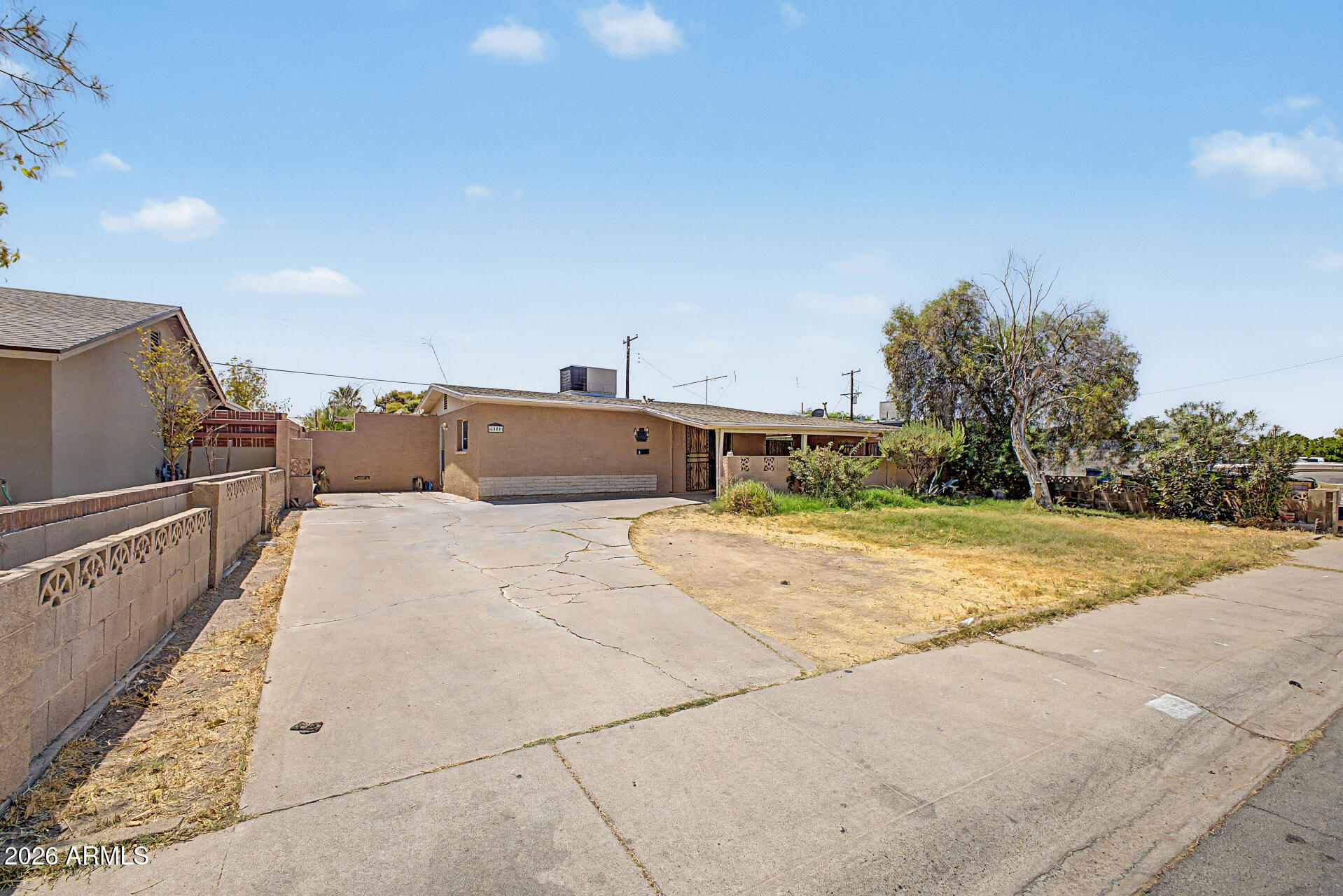 Very solid 3 bedroom, 1 bathroom full of potential, with a few cosmetic updates to make it truly shine. Featuring granite countertop,  beautiful cabinets and tile flooring throughout, plus a covered front porch and ample parking, this home already has some great features in place. Ideal for buyers who want to add their own personal touches and build instant equity.  This is a fantastic opportunity in Maryvale!