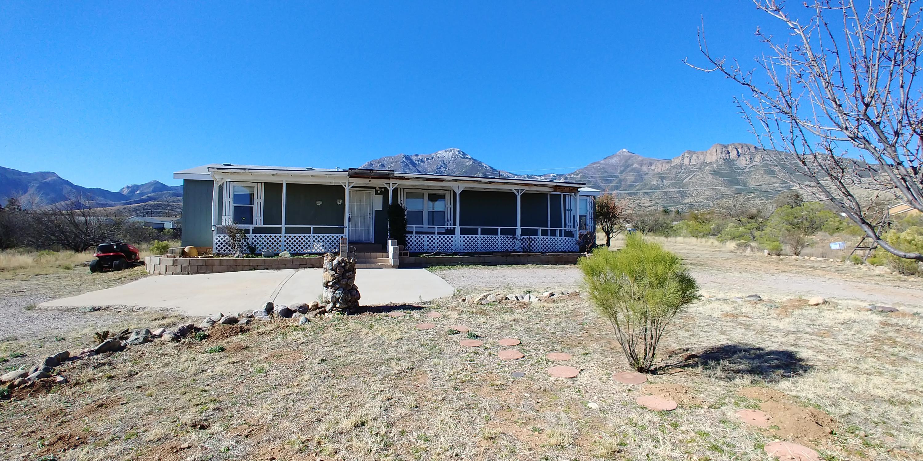 Fix or flip, its up to you! Here is a great opportunity to purchase a very reasonable 3 bedroom 2 bath home. The view of the Huachuca Mtns is right in your face!!! This home has a split plan and also has a formal dining room or den. Thereis fenced backyard as well. There are 3 on the well.
