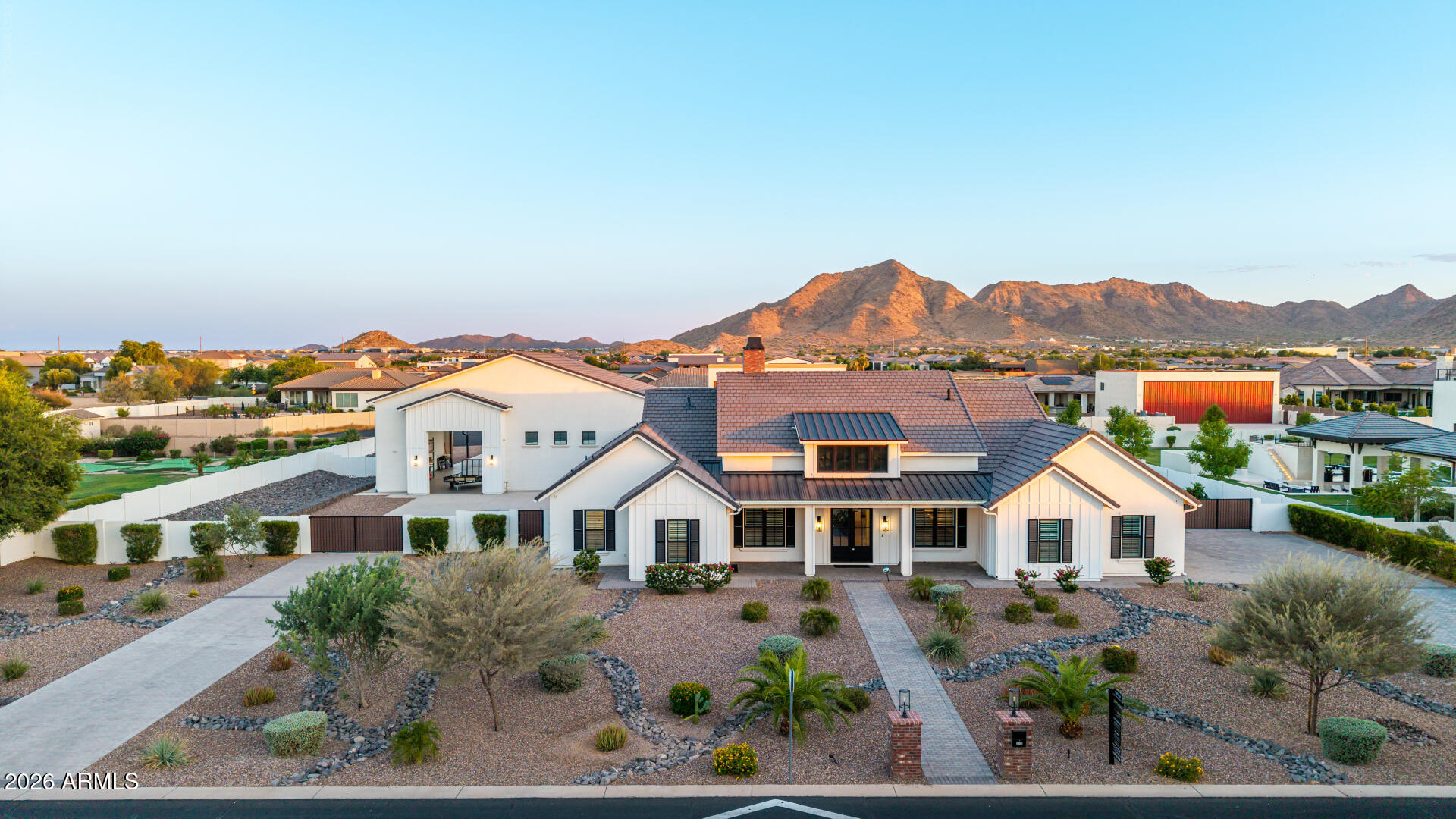 Experience an extraordinary blend of luxury, craftsmanship, and aviation at one of Pegasus Airpark's most exceptional custom estates. Perfectly positioned on more than 1.16 acres with direct taxiway access and on-site fuel availability, this remarkable Rainey Homes custom build  residence, completed in 2021, offers an unparalleled fly-in lifestyle within one of Arizona's most prestigious gated aviation communities.
Designed for both elegant entertaining and effortless everyday living, this single-level estate spans 3,646 square feet and features four spacious bedrooms, four beautifully appointed bathrooms, a private executive office, an expansive game room, and separate guest quarters ideal for extended family or visitors.
Every inch of the home showcases superior craftsmanship and ......timeless design. Stunning rift-sawn inset cabinetry, exquisite quartzite countertops, premium Monogram appliances, designer tile flooring, soaring ceilings, California Closets throughout, climate controlled 3-car garage, and a concealed walk-in pantry create a refined yet highly functional living experience. The expansive great room seamlessly connects to the chef's kitchen, creating an inviting atmosphere that embraces Arizona's indoor-outdoor lifestyle.
A true centerpiece of the property is the impressive 50' x 60' fully insulated, climate-controlled aircraft hangar. Designed with versatility in mind, it features a 60-foot one-piece hydraulic aircraft door, an additional front RV door, durable epoxy flooring, spray foam insulation, direct rear taxiway access, and convenient on-site fuel access. Whether you're an aviation enthusiast, aircraft owner, automobile collector, RV owner, or passionate hobbyist, this extraordinary space offers endless possibilities rarely found in residential real estate.
Step outside into your own private resort-inspired retreat. Enjoy a heated diving-depth pool and spa, built-in outdoor kitchen with BBQ, expansive covered patio, inviting fire feature, professionally designed desert landscaping, lush synthetic turf, and breathtaking mountain views that provide the perfect backdrop for year-round Arizona living.
Located within the exclusive gated Pegasus Airpark in Queen Creek--one of Arizona's premier residential aviation communities--this exceptional estate offers far more than a luxury home. It presents a rare opportunity to embrace a lifestyle defined by freedom, sophistication, adventure, and the convenience of direct fly-in, fly-out access.
This is luxury living without compromise.