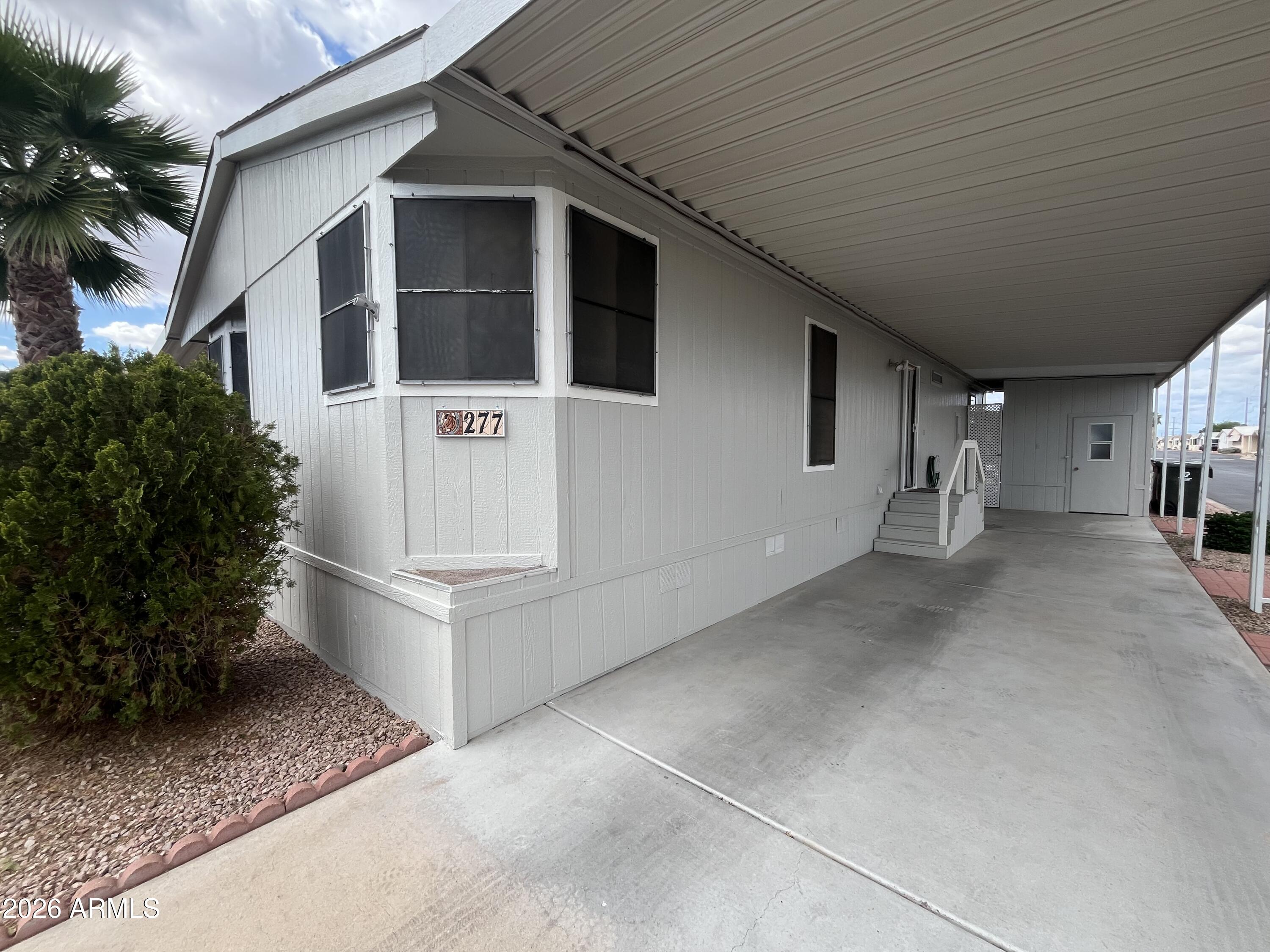 This Spacious 2Bed 2Bath+Den/Office Has been Freshly Painted Inside and out! with a GREAT floor plan that  sits on a corner lot. With a screened in Patio to enjoy morning coffee or quiet evenings. This Cozy retreat Is located In the ACTIVE, GATED 55+Community of Rose Garden.Surrounded by restaurants, hiking, golf courses, and close to shopping! With 2 Large Dog Parks, Pickle Ball, Workout Facility, Swimming Pool/Heated, and much much more!!
