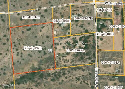 Affordable acreage opportunity in Paulden--approximately 7.5 acres of vacant Northern Arizona land offering expanded space, flexibility, and long-term potential. Located along W Harris Rd, this parcel features accessible terrain, natural high-desert landscape, and wide-open views in a quiet rural setting. Zoned RCU-2A, the property allows for a variety of uses, including a custom home, small ranch setup, recreational retreat, or land investment. With no existing improvements, it provides a blank canvas for those looking to build now or hold for future appreciation. Larger than typical entry-level parcels in the area, this property offers added usability and separation while still maintaining affordability--This parcel is also part of a multi-parcel bulk offering, see MLS # 7034440